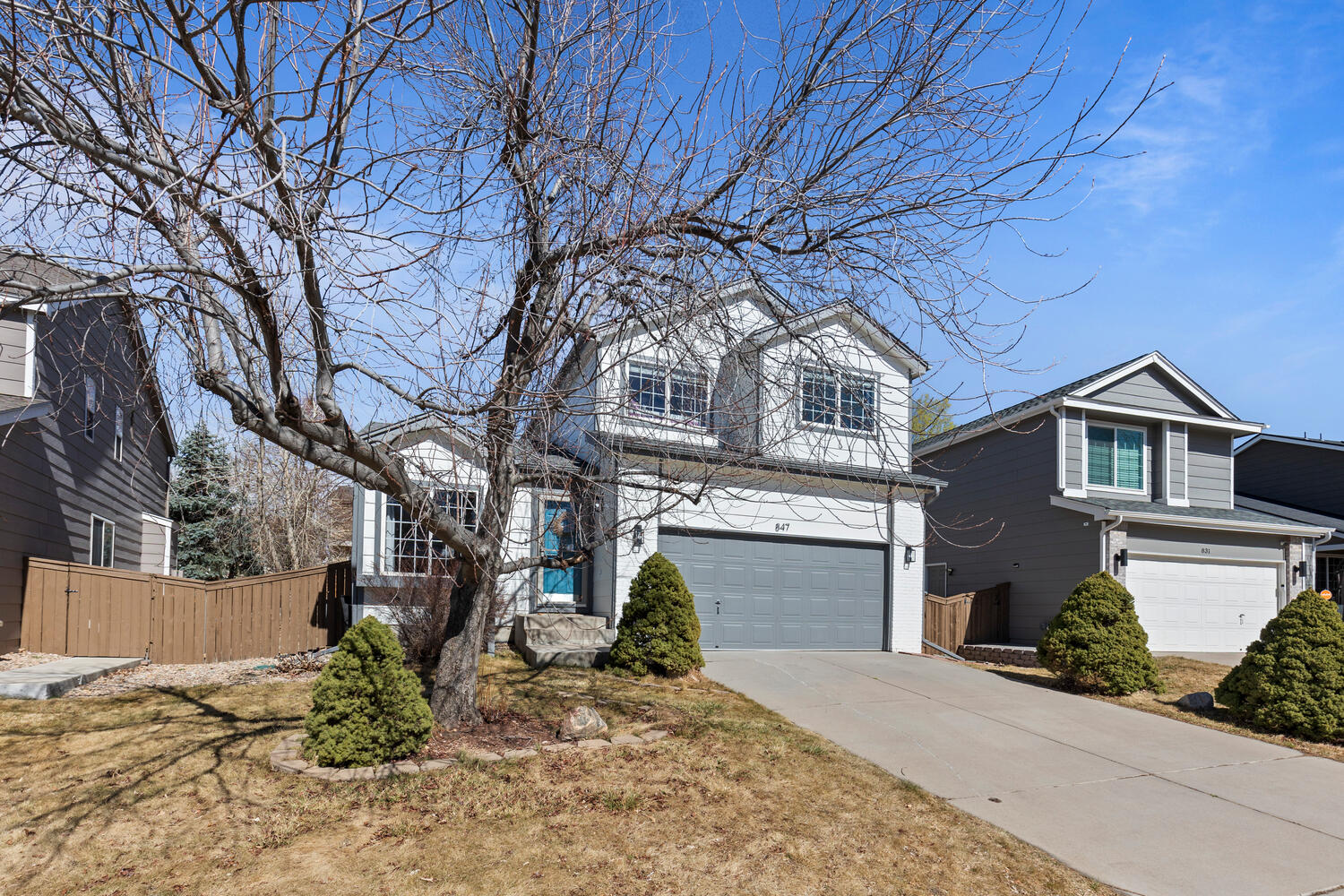 847 Timbervale Trail Highlands Ranch, CO 80129 - Photo 1 of 36 a front view of a house with a yard