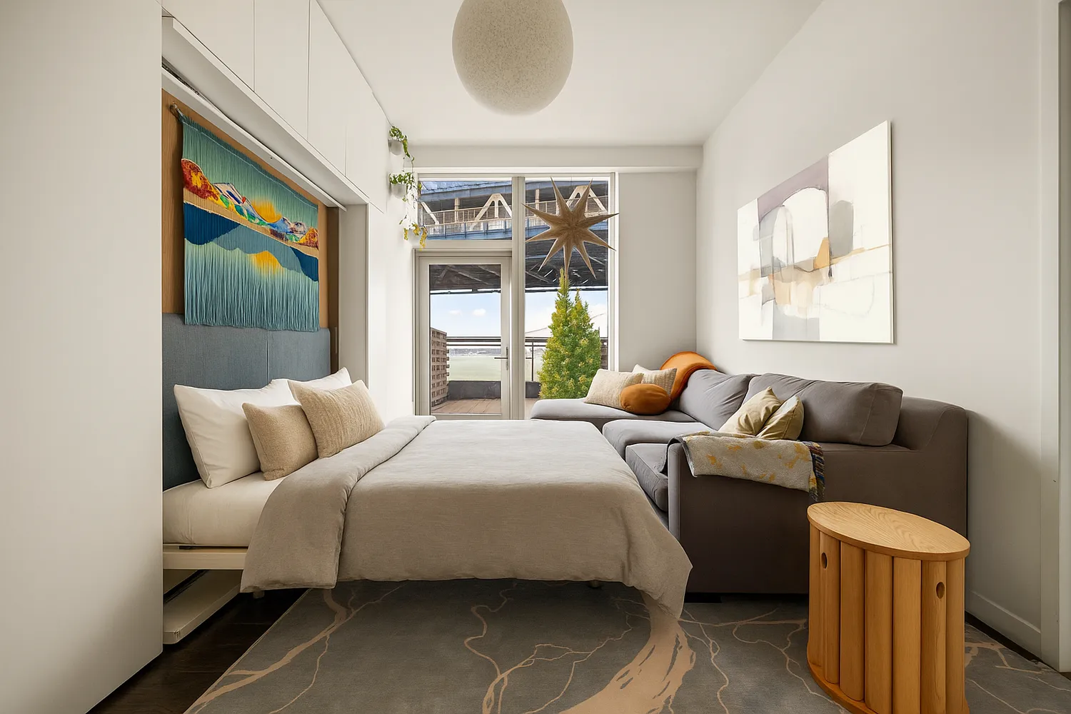 a bedroom with bed couch and window