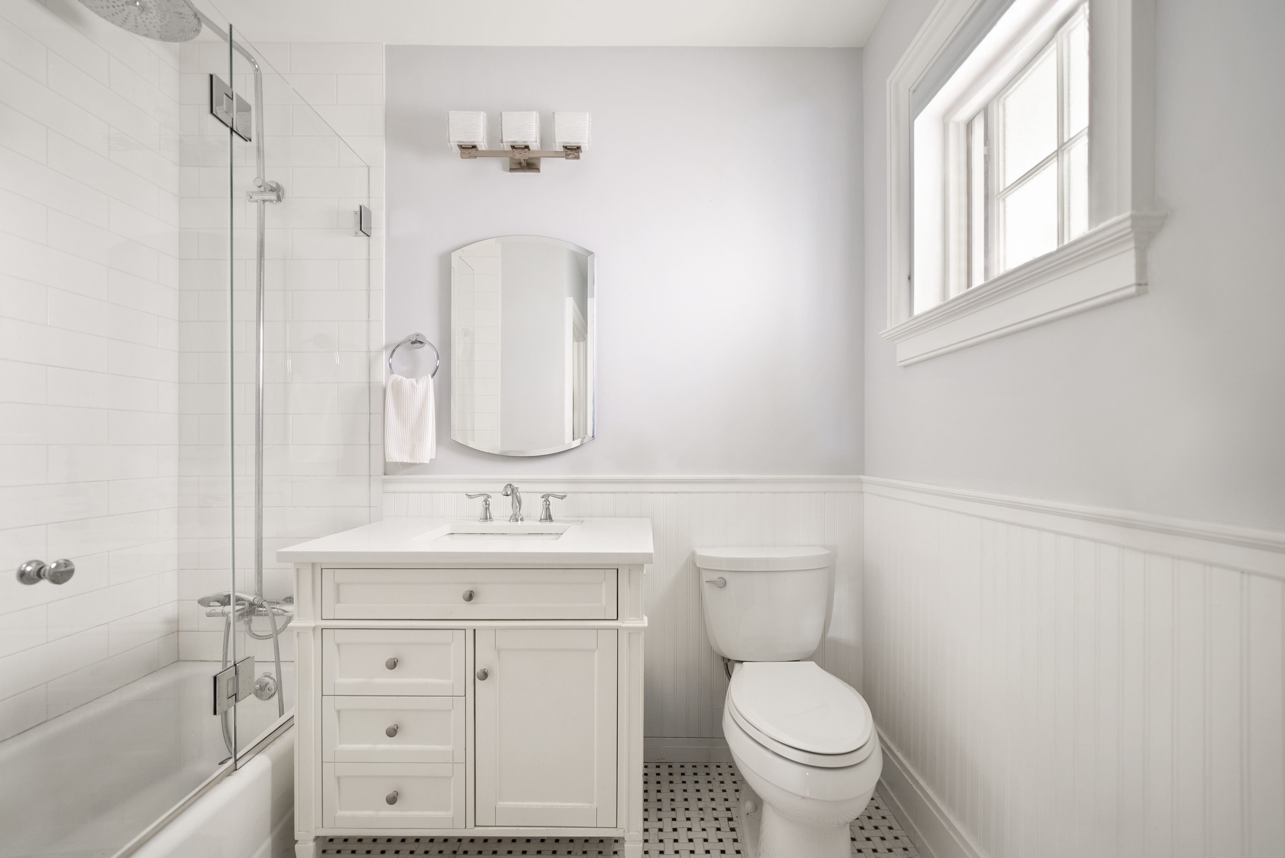 139 Winthrop Street, Unit 2 Brooklyn, NY 11225 - Photo 8 of 8 a bathroom with a toilet sink and mirror