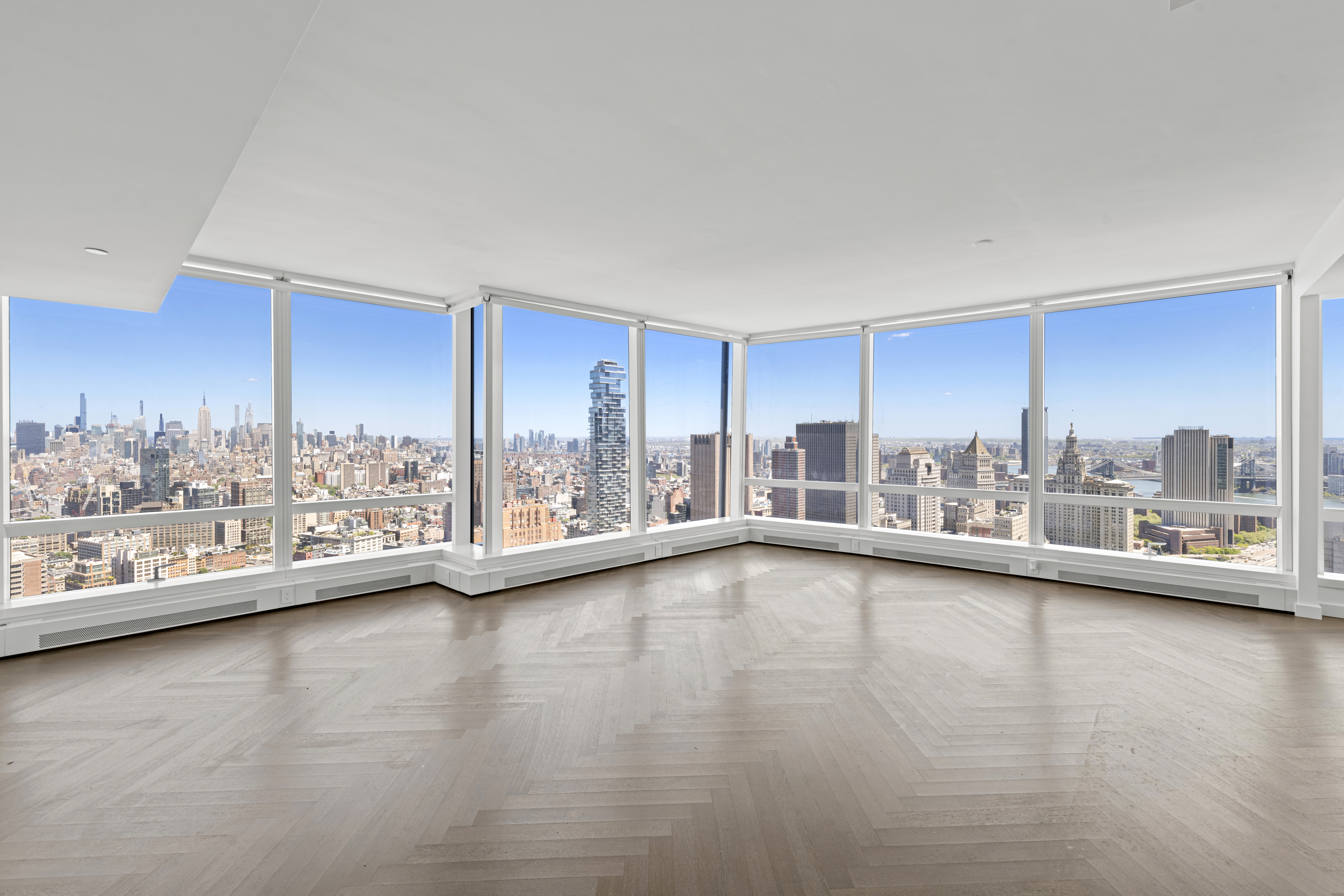 111 Murray Street, Unit 51EAST Manhattan, NY 10007 - Photo 6 of 42 a view of a living room with hardwood floor and a large window