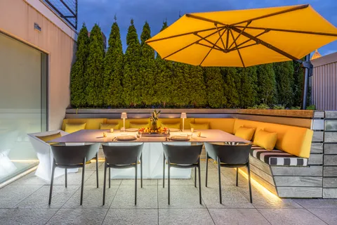 a view of a swimming pool with a lounge chairs