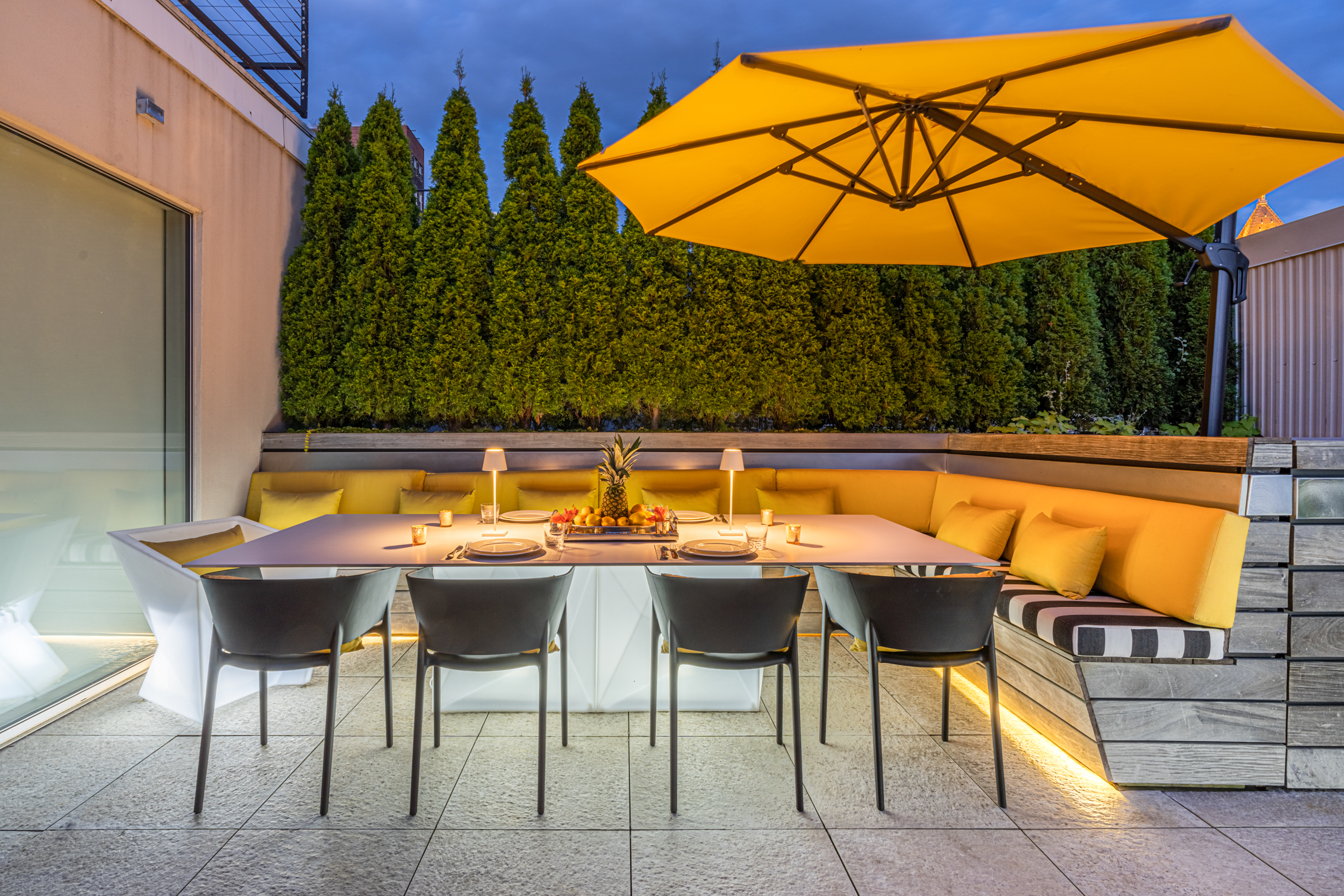 42 White Street, Unit PH Manhattan, NY 10013 - Photo 20 of 22 a view of a swimming pool with a lounge chairs