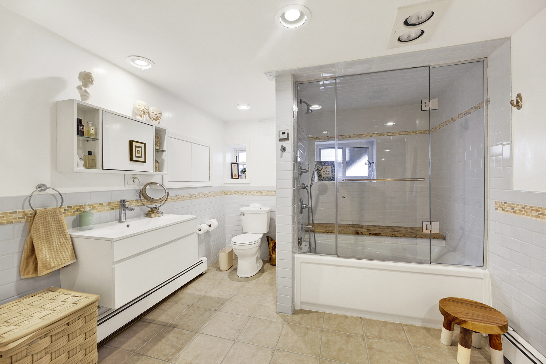 4-53 Beach 142nd Street Queens, NY 11694 - Photo 29 of 39 a bathroom with a sink a toilet and bathtub