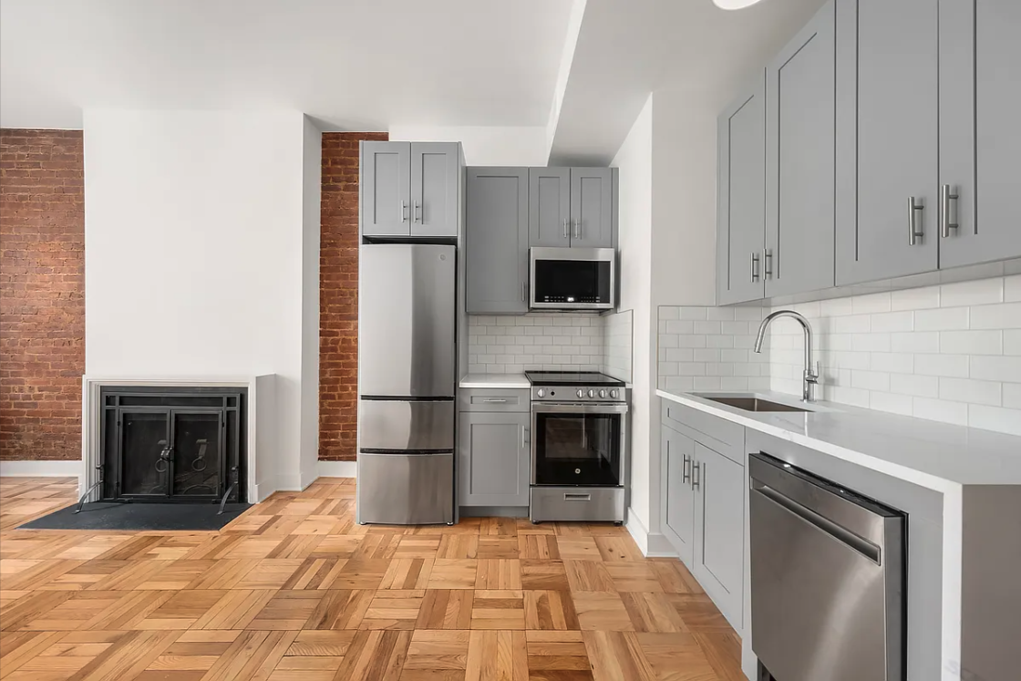 151 West 80th Street, Unit 4F Manhattan, NY 10024 - Photo 2 of 8 a kitchen with a sink stove and refrigerator