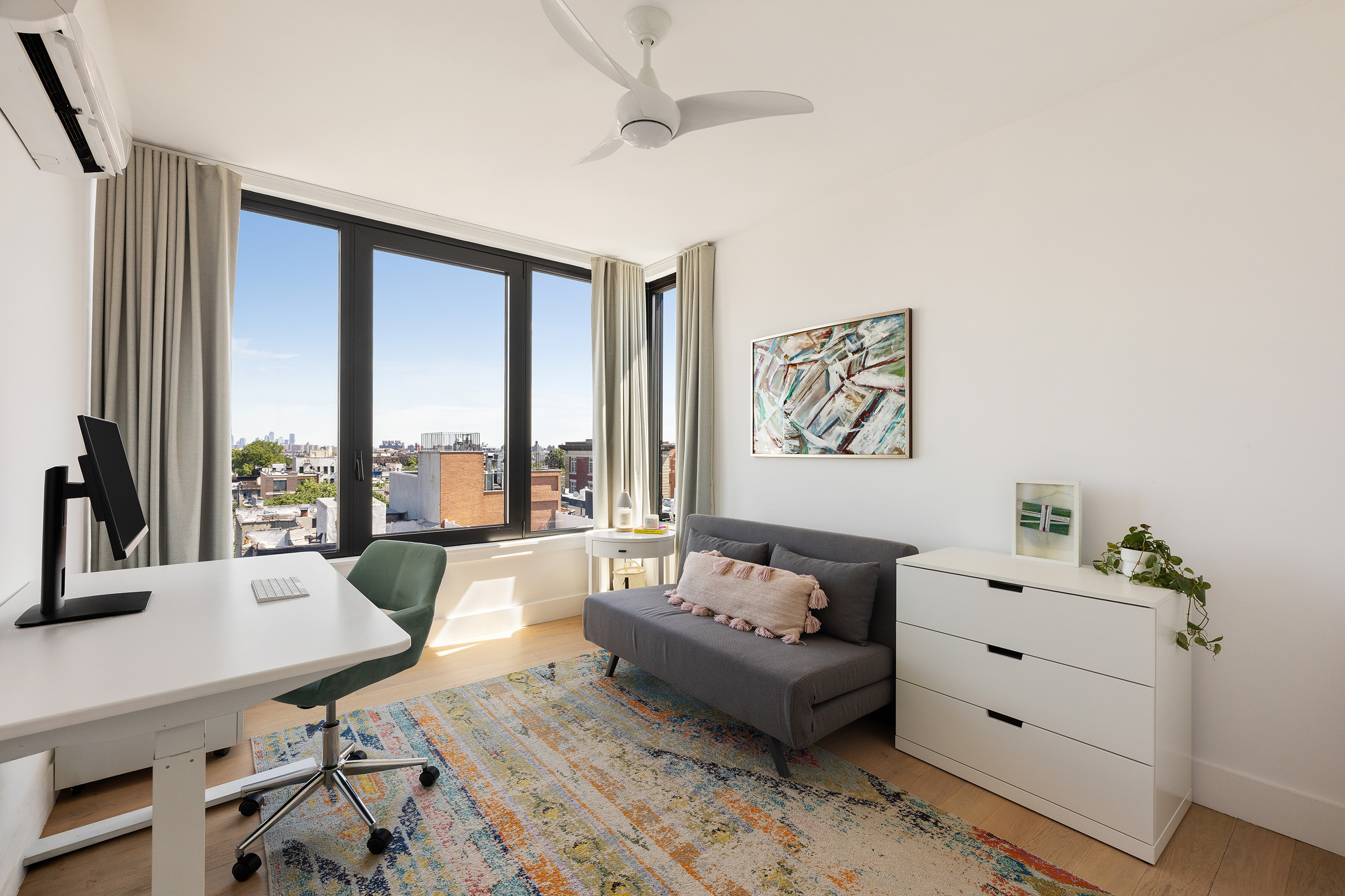 762 Park Place, Unit PH1 Brooklyn, NY 11216 - Photo 6 of 15 a living room with furniture and a large window
