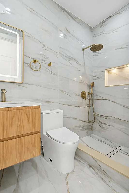 457 Bergen Street, Unit 2F Brooklyn, NY 11217 - Photo 12 of 12 a bathroom with a toilet and a shower