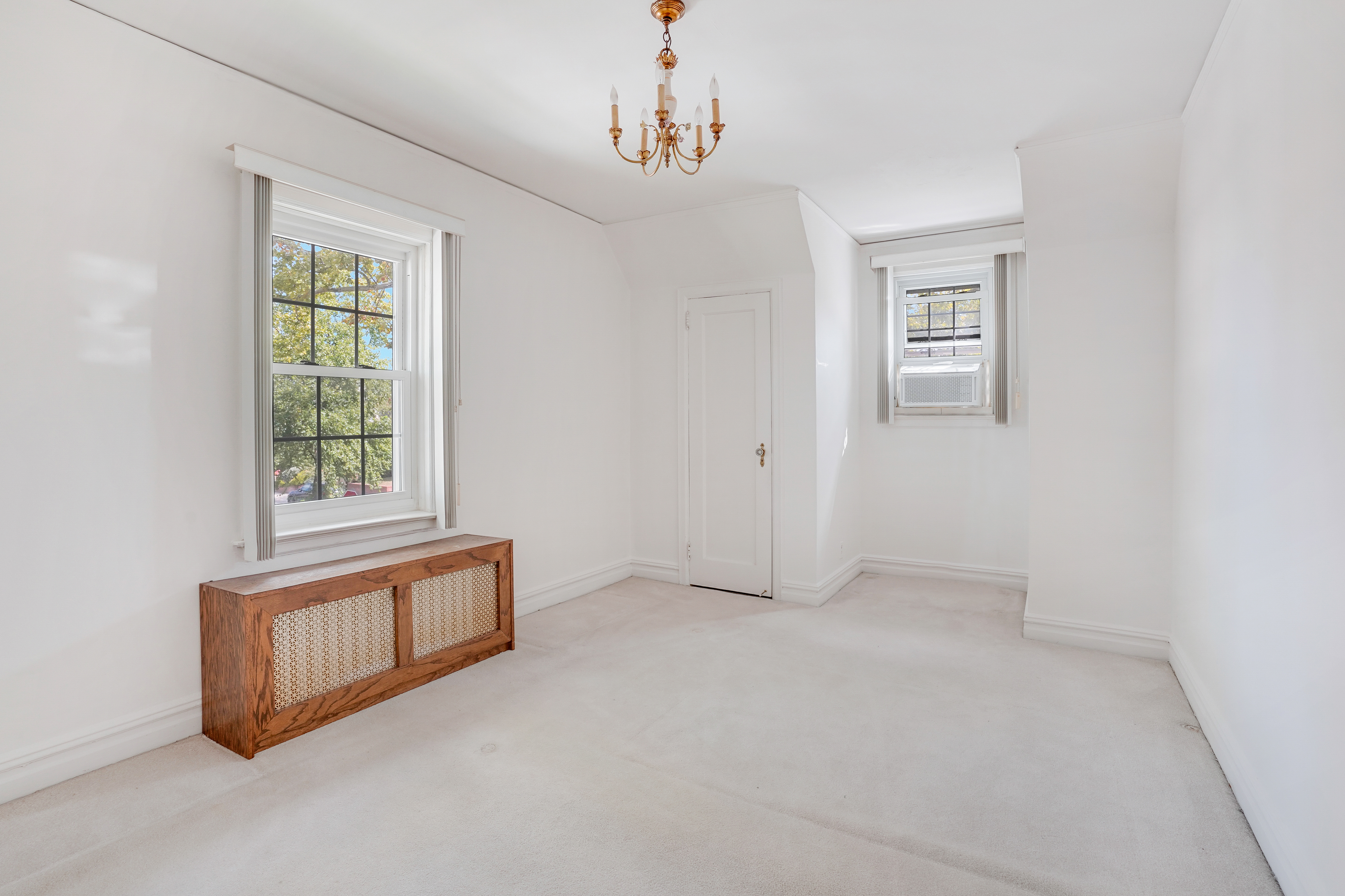 8028 Harbor View Terrace Brooklyn, NY 11209 - Photo 10 of 16 an empty room with windows