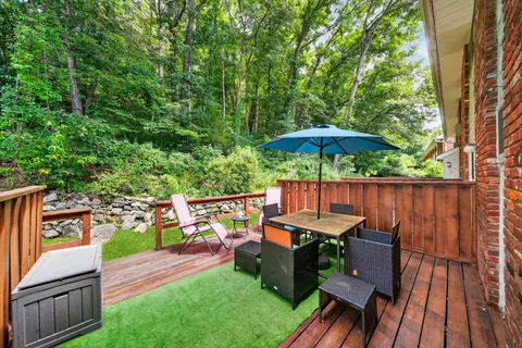 a view of a patio with furniture
