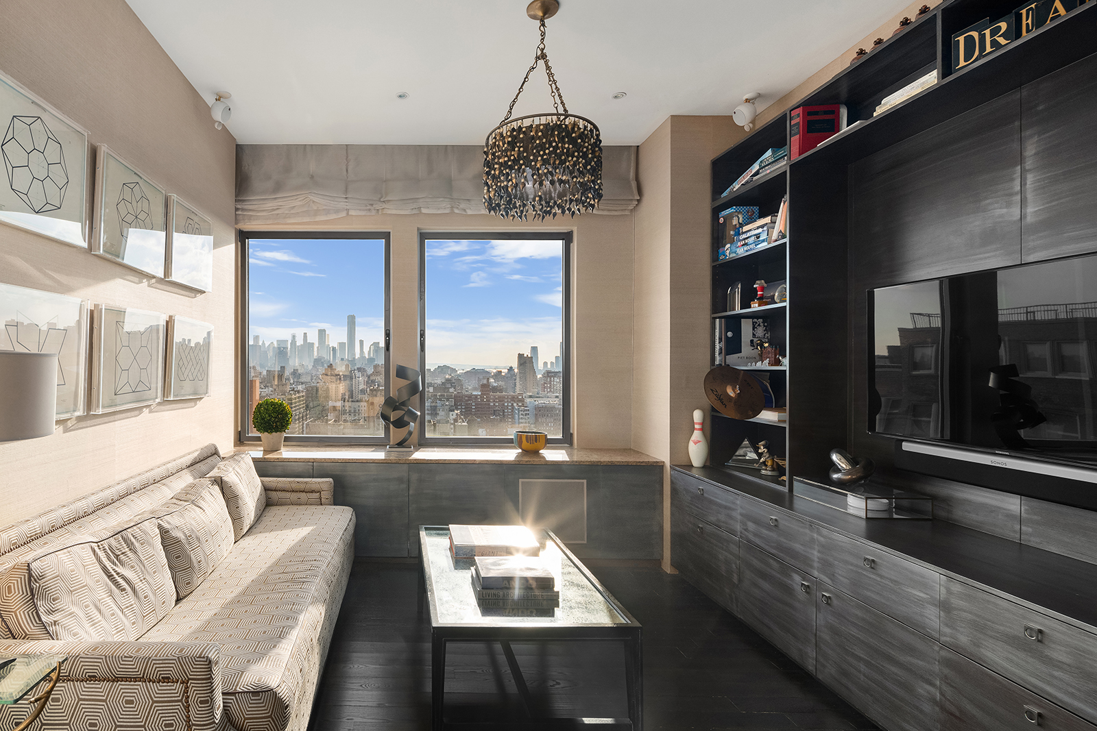 252 7th Avenue, Unit PHD Manhattan, NY 10001 - Photo 9 of 26 a living room with furniture and a large window