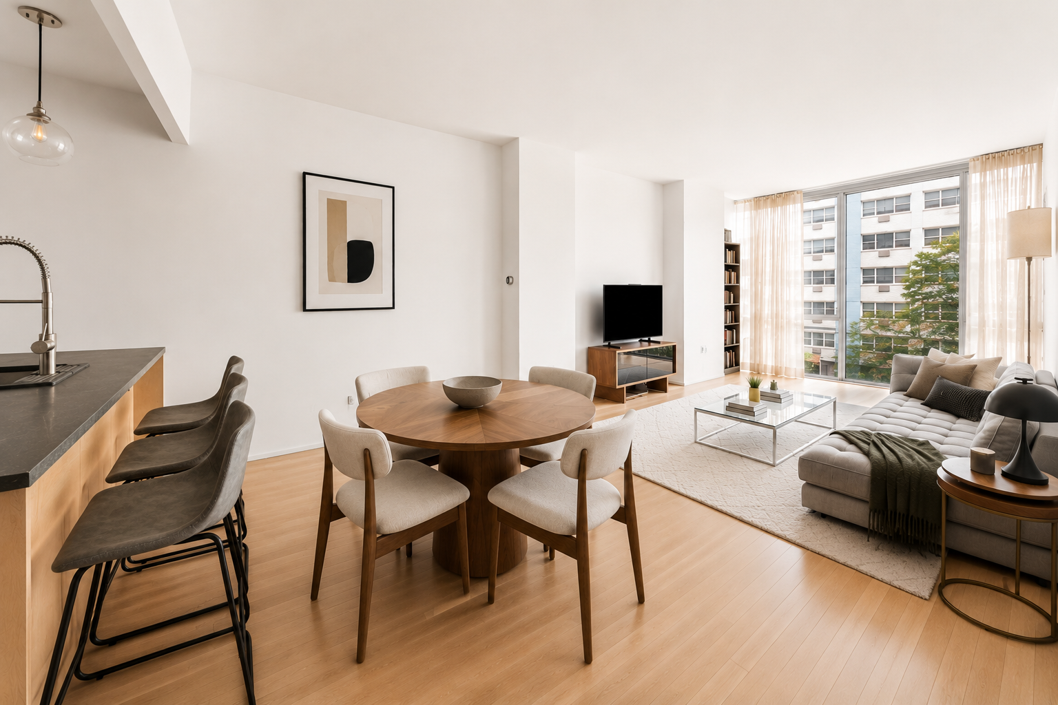 a view of a livingroom with furniture and a window