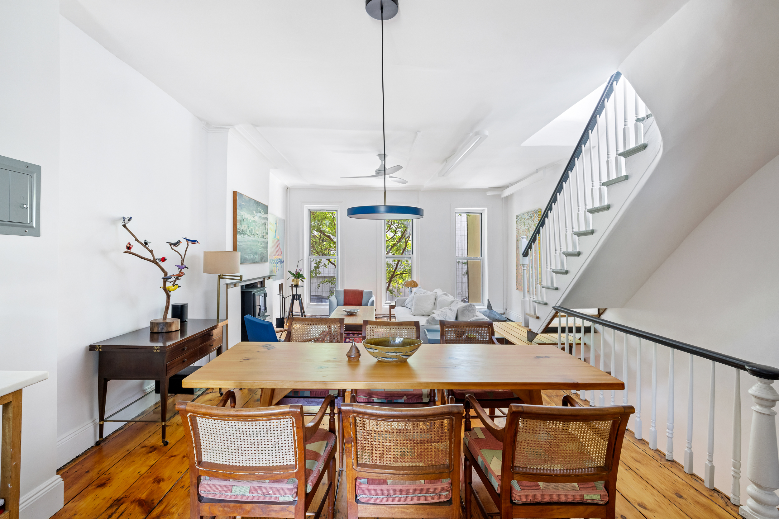 437 Warren Street Brooklyn, NY 11217 - Photo 5 of 17 a view of a dining room with furniture window and wooden floor