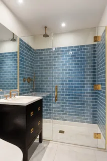 a bathroom with a sink and a shower