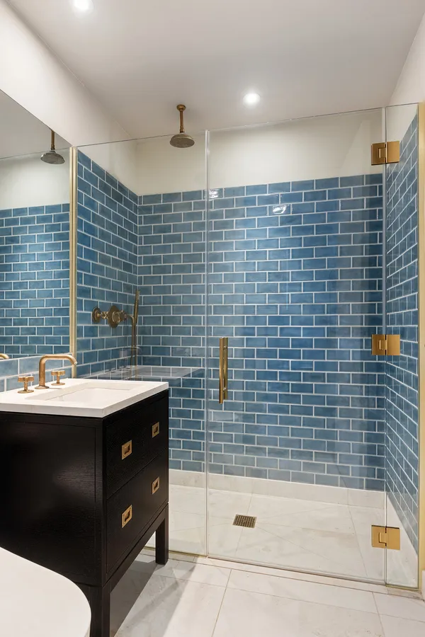 a bathroom with a sink and a shower