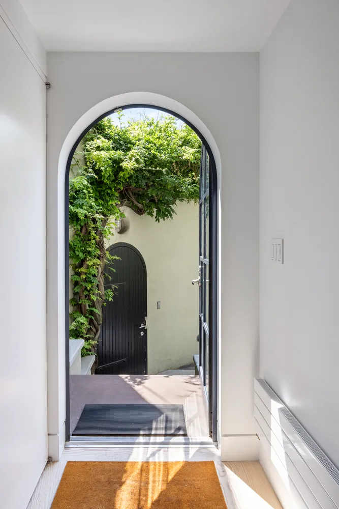 an empty room with a garden