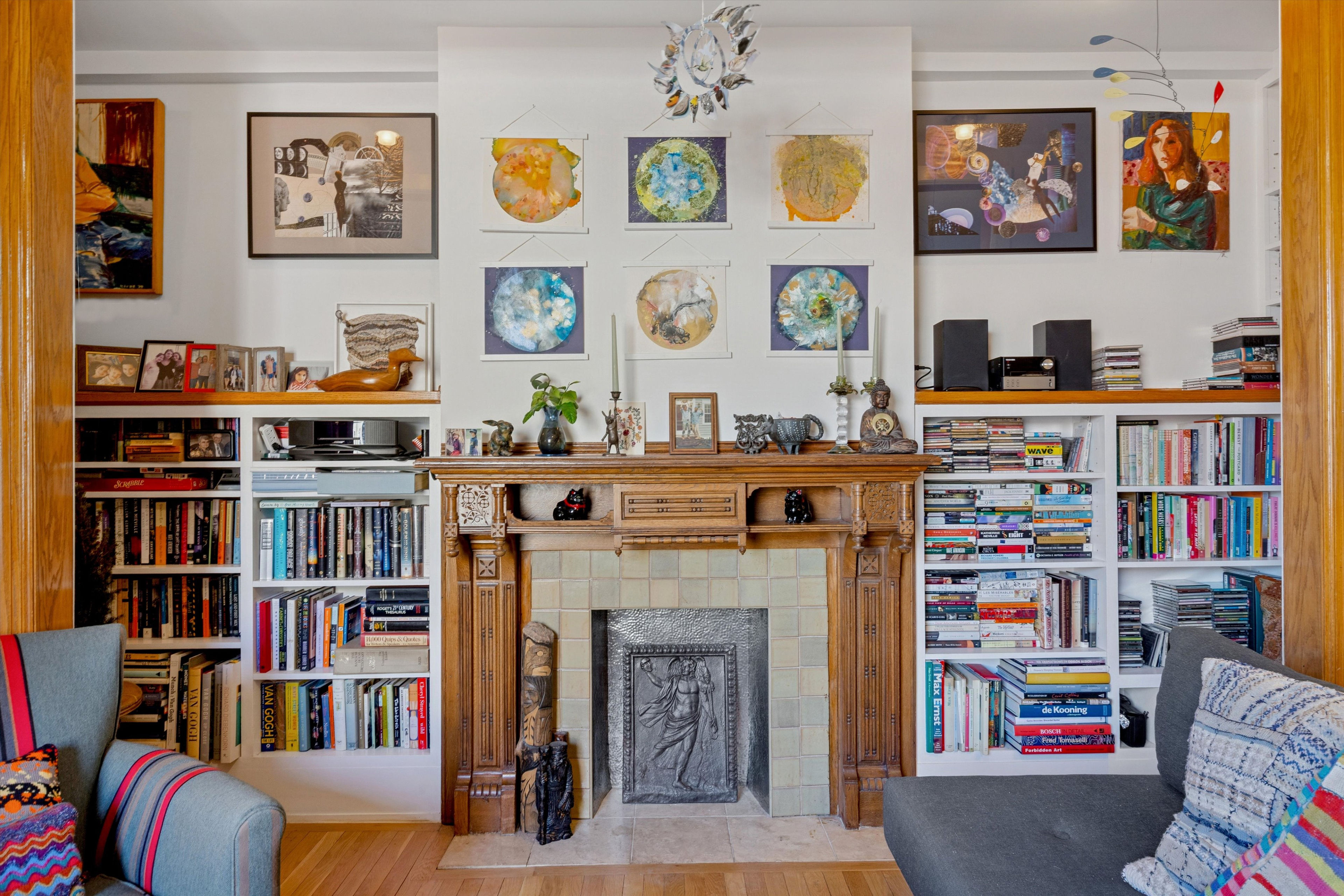 127 West 82nd Street, Unit 8A Manhattan, NY 10024 - Photo 3 of 15 a living room with furniture and a bookshelf