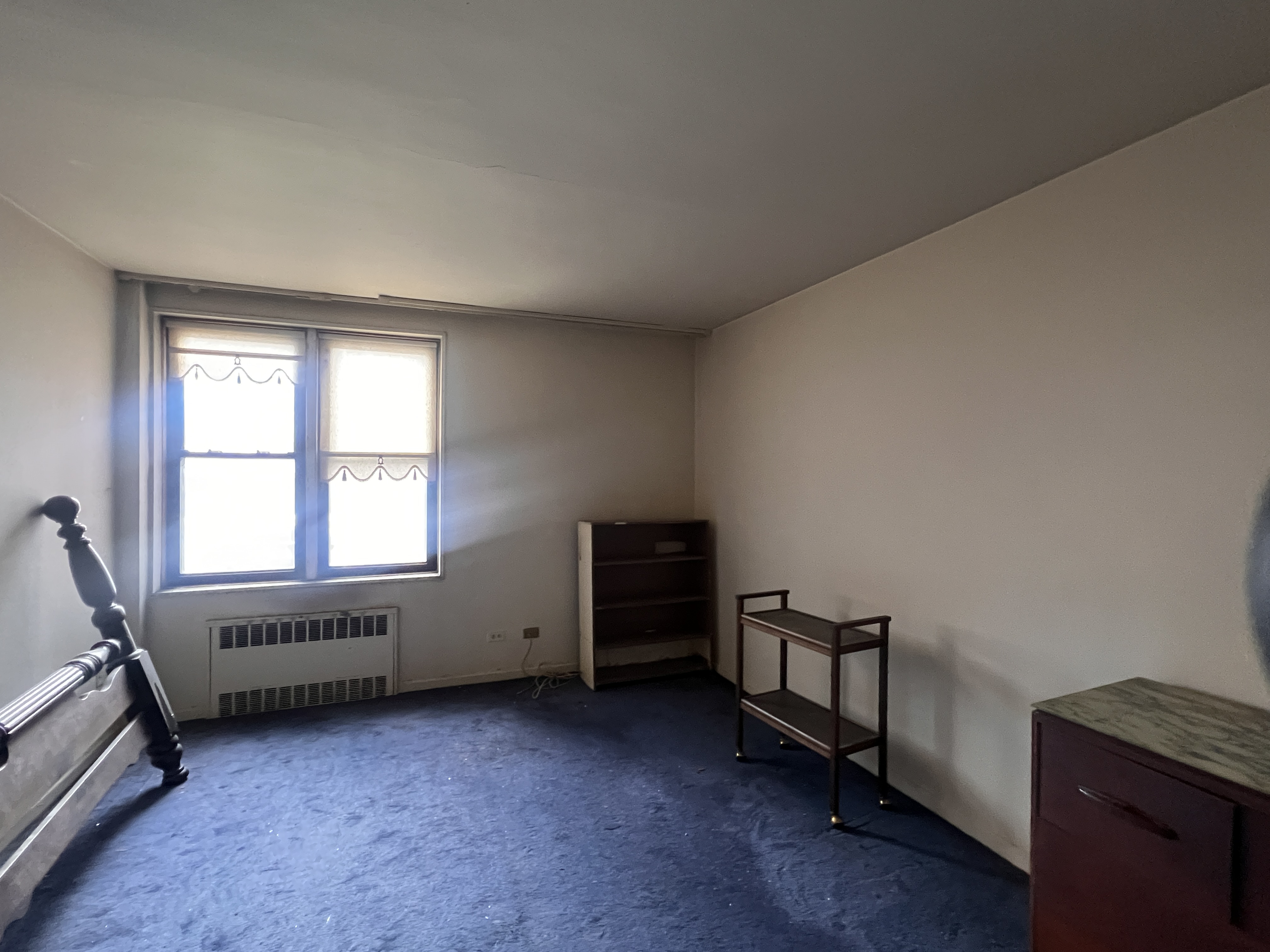 2251 Knapp Street, Unit 1C Brooklyn, NY 11229 - Photo 3 of 12 a view of an empty room with a window