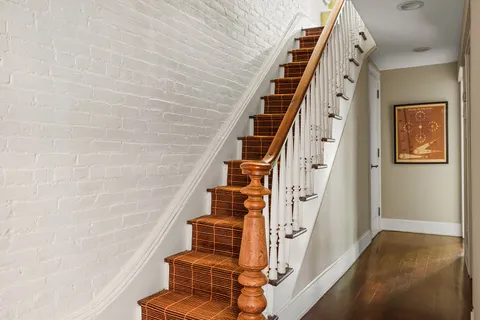 a view of entryway with wooden floor