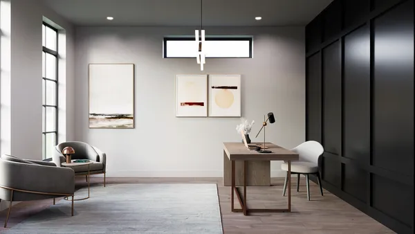 a work room with furniture and wooden floor