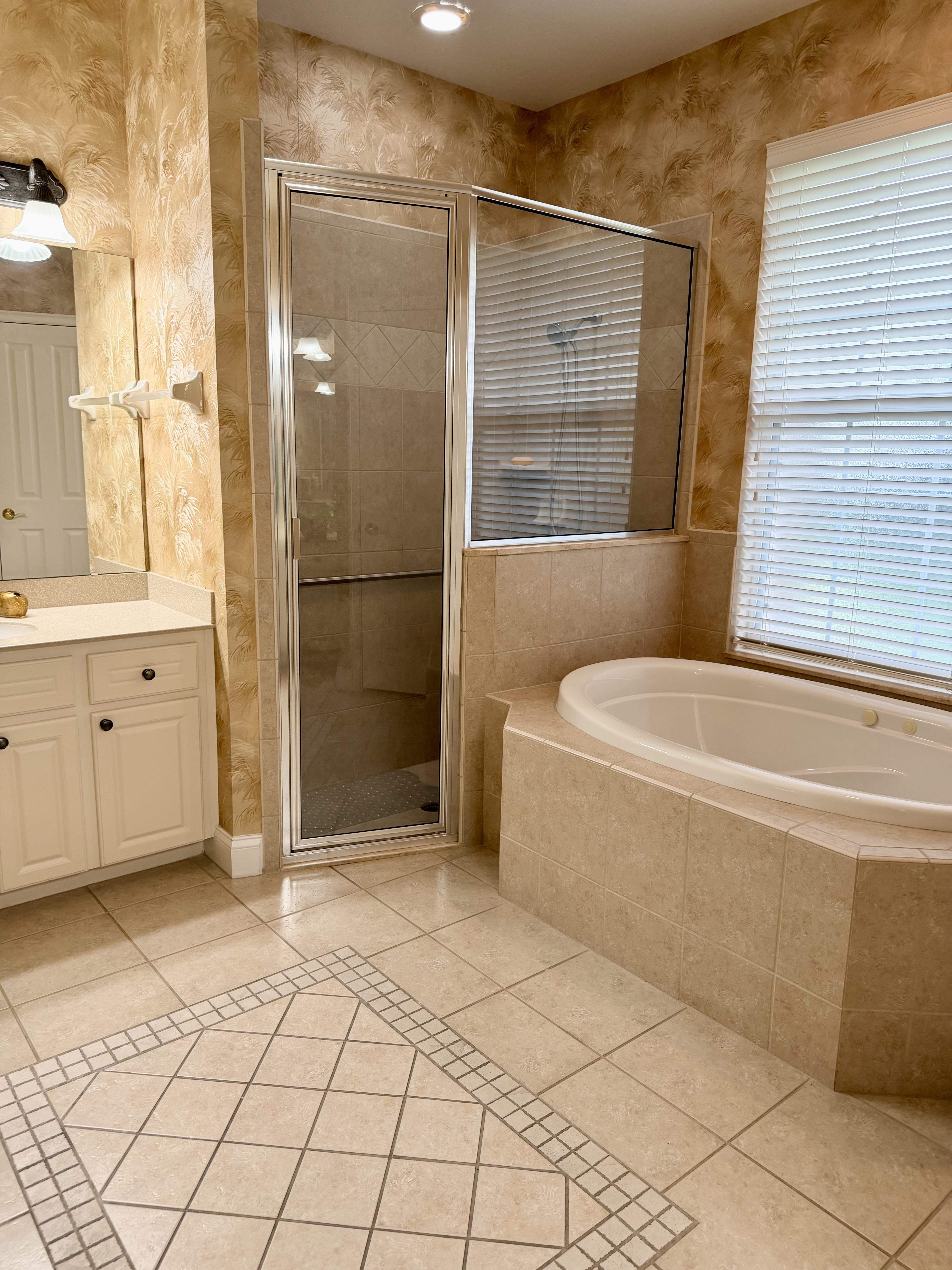 3196 Hawks Ridge Drive Lakeland, FL 33810 - Photo 10 of 14 a bathroom with a bathtub and shower