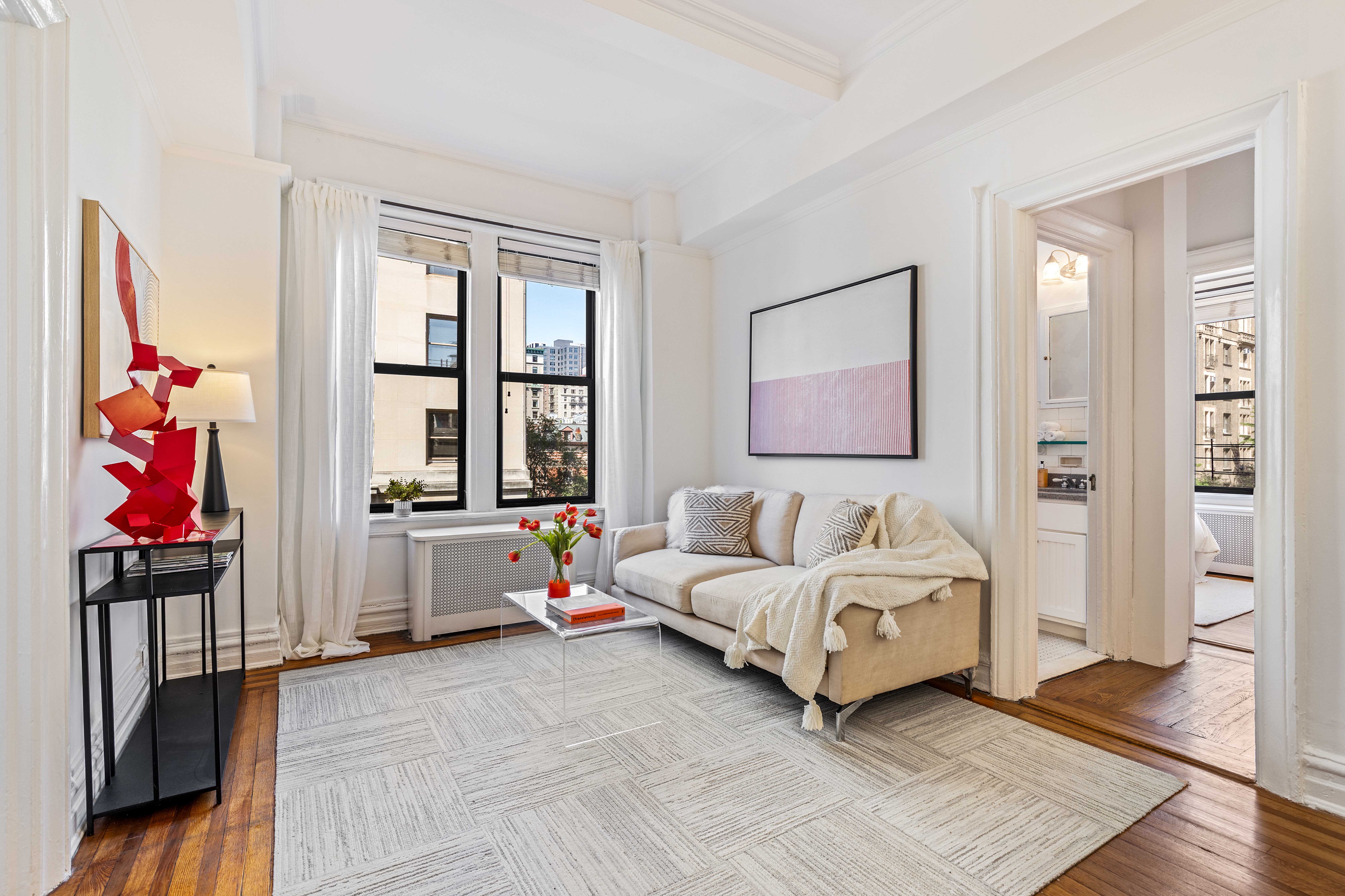 599 West End Avenue, Unit 5A Manhattan, NY 10024 - Photo 1 of 11 a living room with furniture and a window