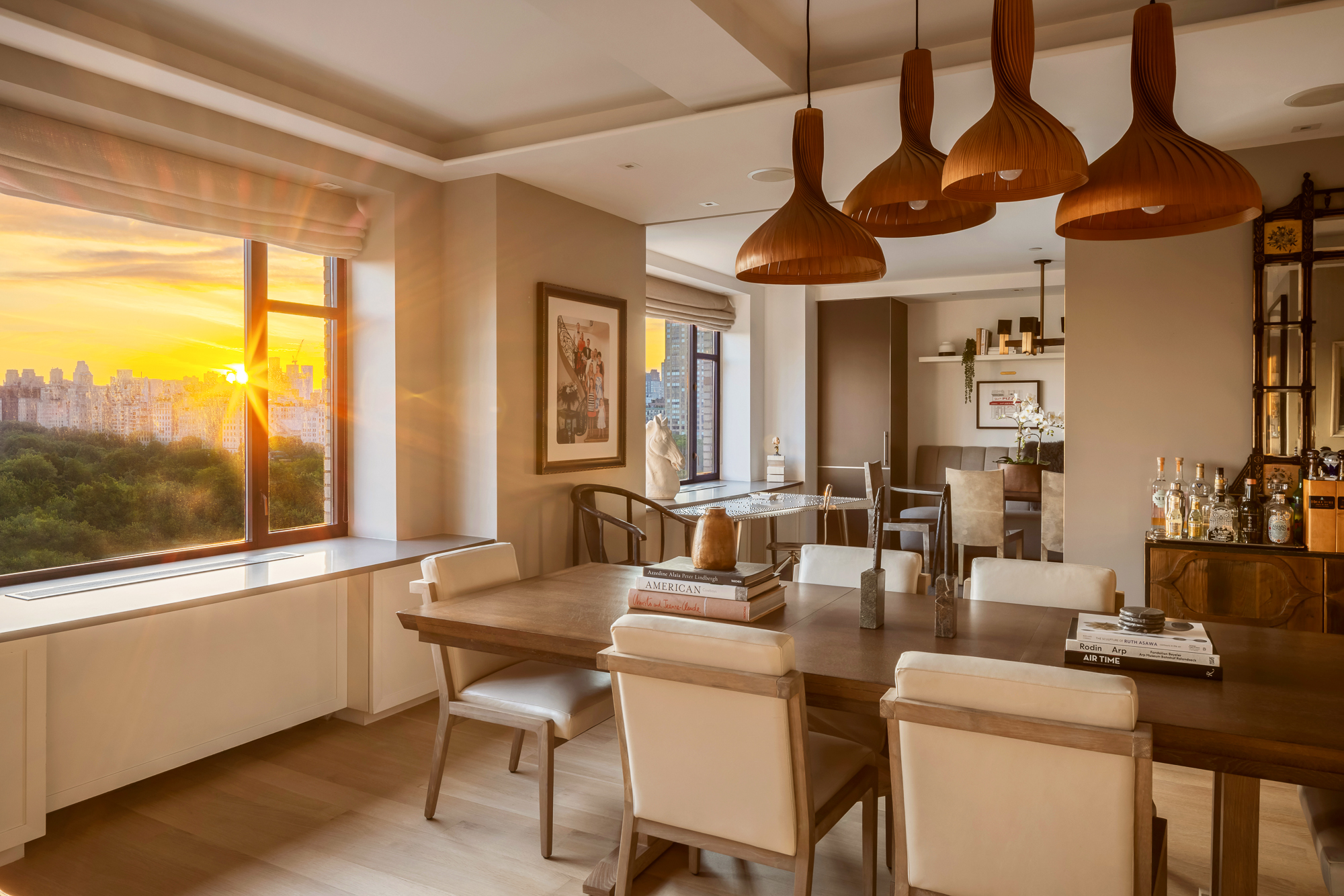 110 Central Park South, Unit 12ABC Manhattan, NY 10019 - Photo 14 of 49 a dining room with furniture a chandelier and window