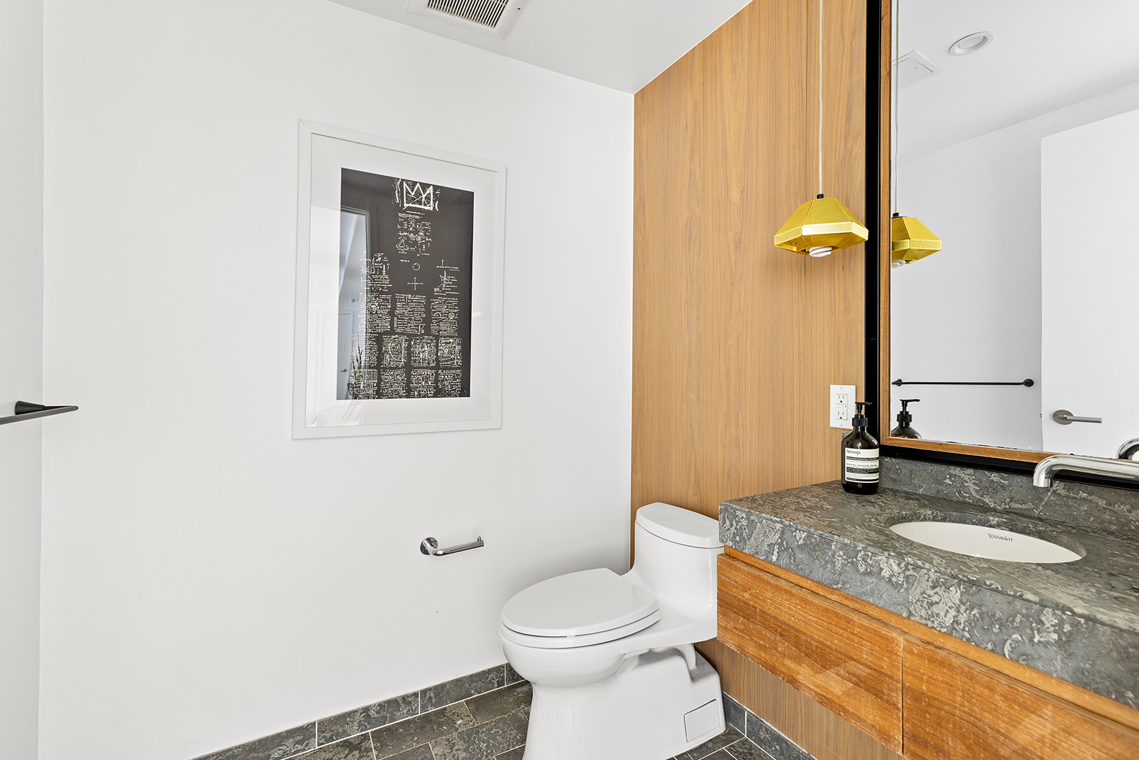 610 Warren Street, Unit GDNB Brooklyn, NY 11217 - Photo 12 of 17 a bathroom with a granite countertop sink toilet and a mirror