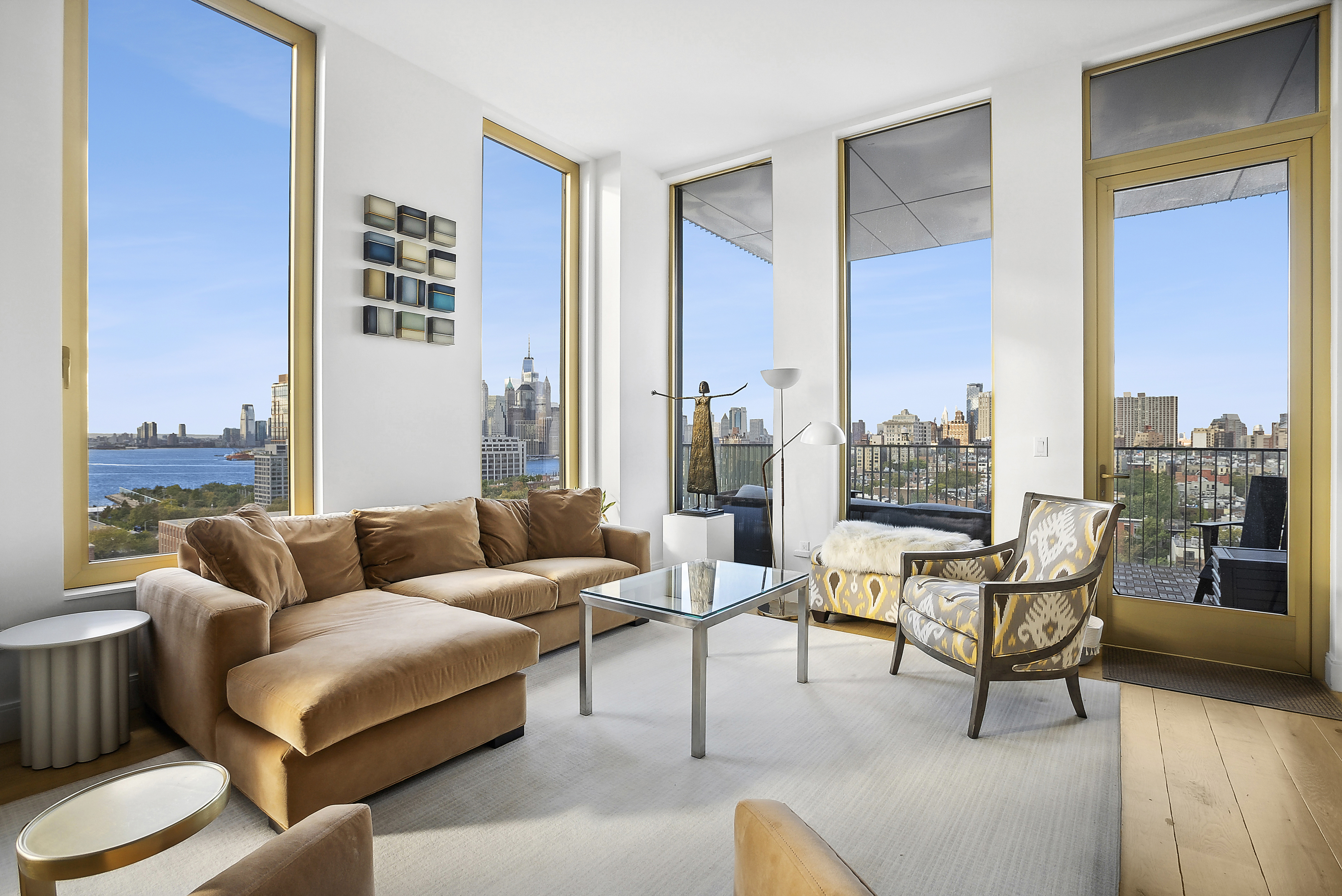 347 Henry Street, Unit 12A Brooklyn, NY 11201 - Photo 4 of 26 a living room with furniture and a floor to ceiling window