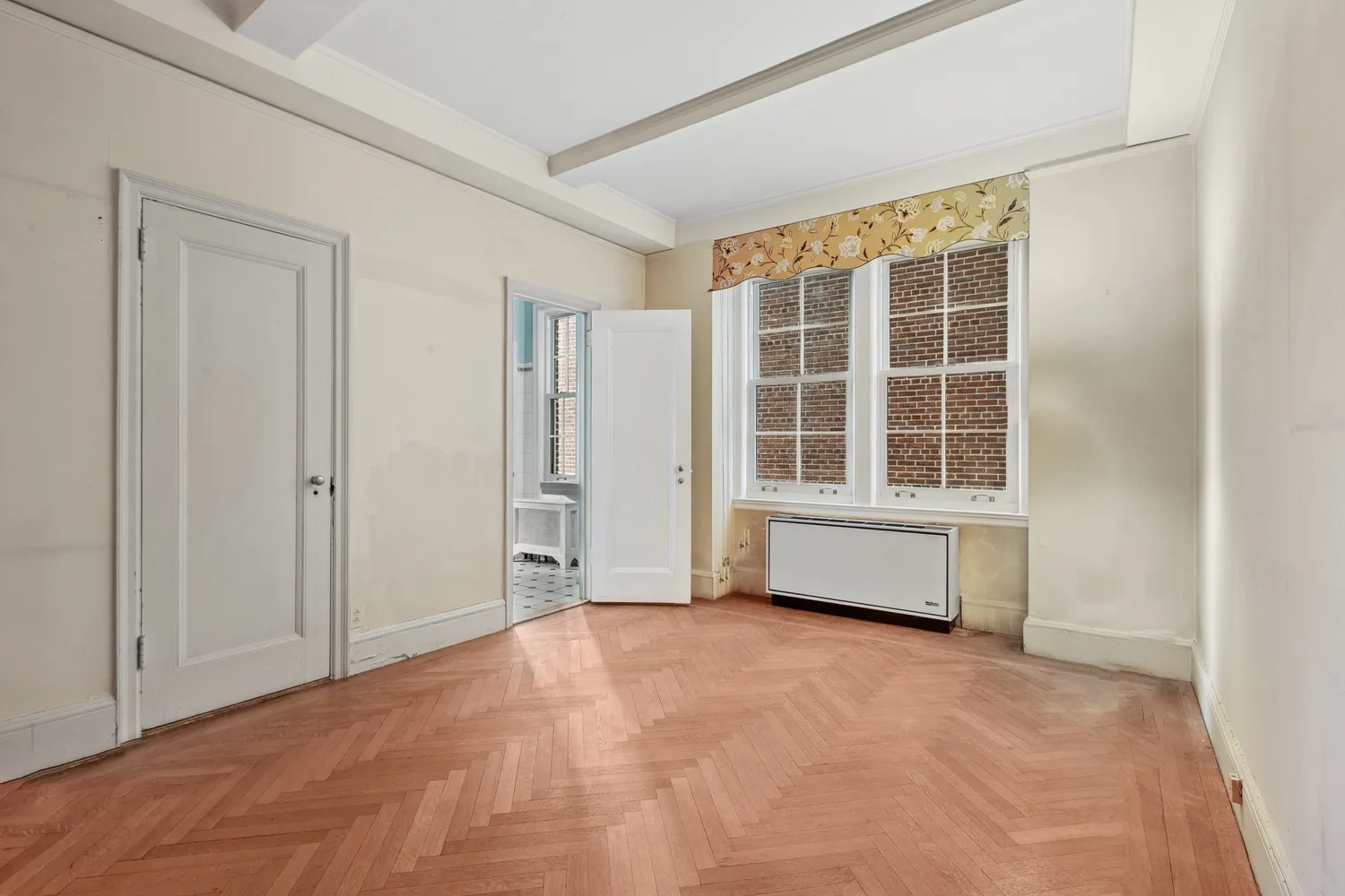 an empty room with windows