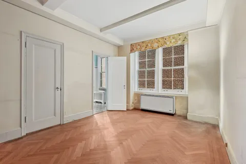 an empty room with windows