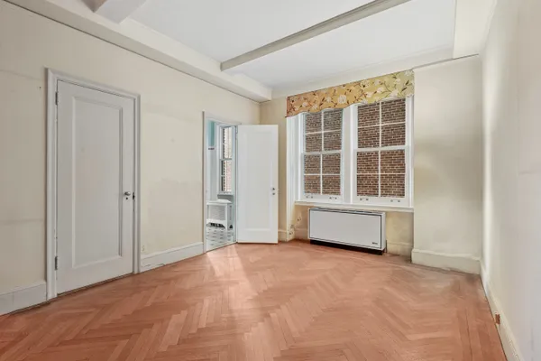 an empty room with windows