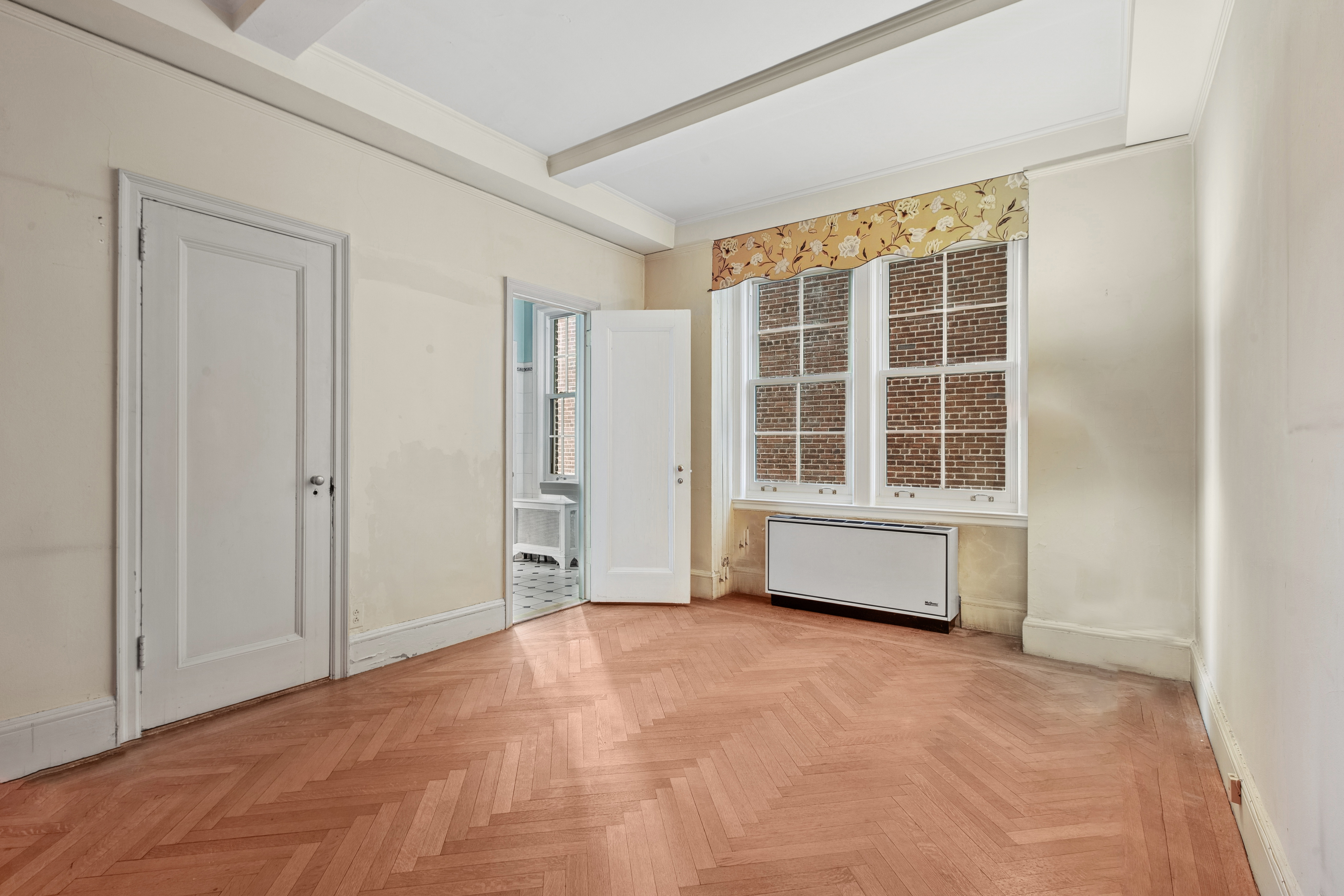 1170 5th Avenue, Unit 6A Manhattan, NY 10029 - Photo 11 of 17 an empty room with windows