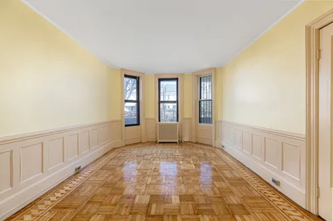 a view of an empty room and window