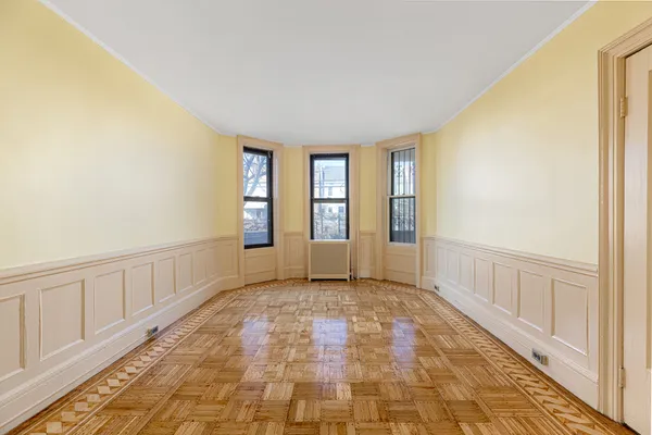 a view of an empty room and window