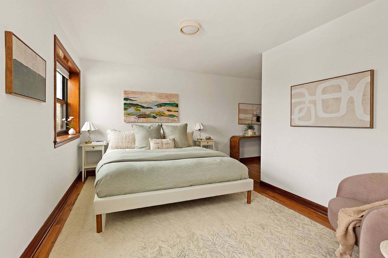 375 Lincoln Place, Unit 4F Brooklyn, NY 11238 - Photo 5 of 10 a bedroom with a bed lamp on desk and a window