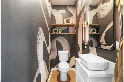 a bathroom with a toilet and a sink