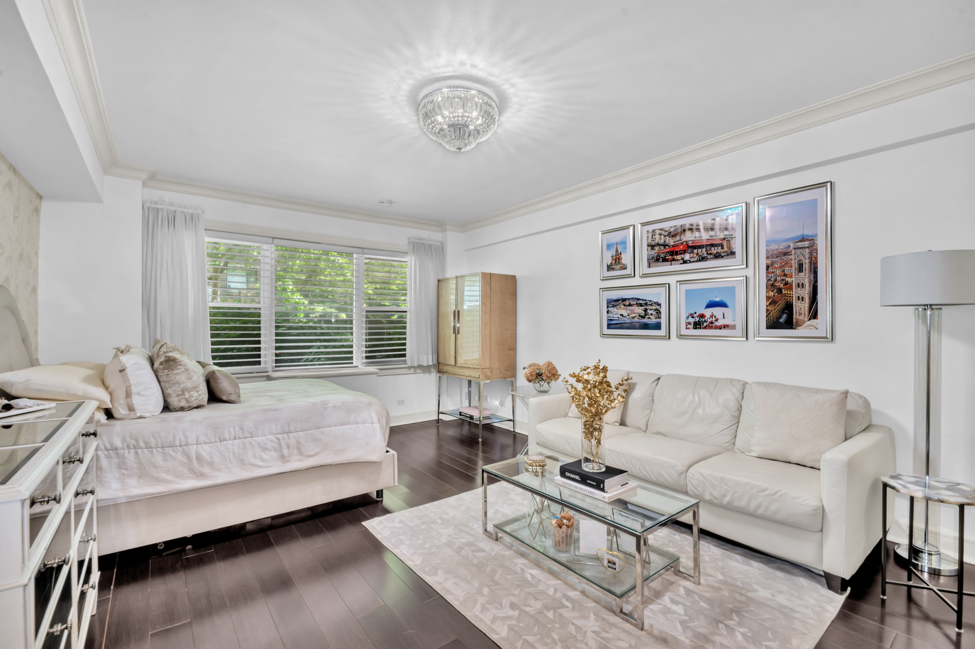 310 East 49th Street, Unit 1E Manhattan, NY 10017 - Photo 2 of 11 a living room with furniture and a large window