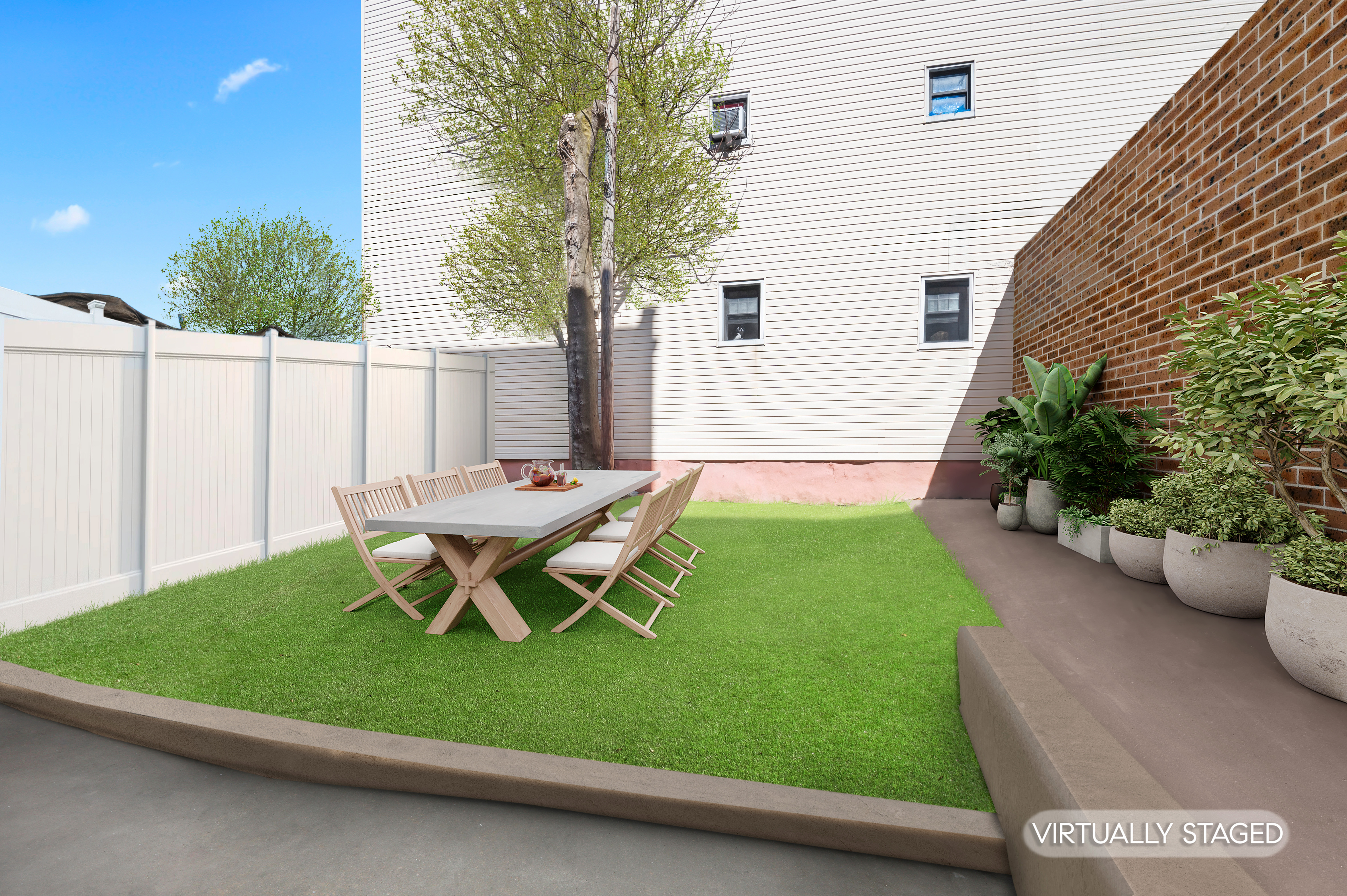 181 Knickerbocker Avenue, Unit 1R Brooklyn, NY 11237 - Photo 3 of 4 a view of a patio with table and chairs potted plants with wooden fence