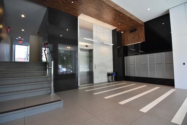 315 Gates Avenue, Unit 3H Brooklyn, NY 11216 - Photo 5 of 12 a view of a hallway with stairs