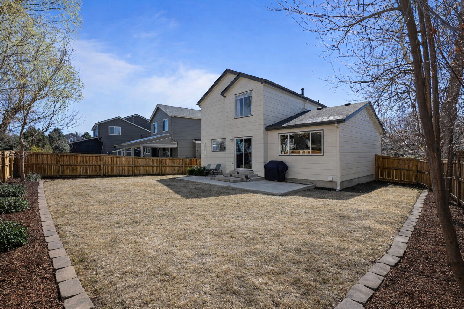 847 Timbervale Trail Highlands Ranch, CO 80129 - Photo 33 of 36 a view of a house with snow on the road