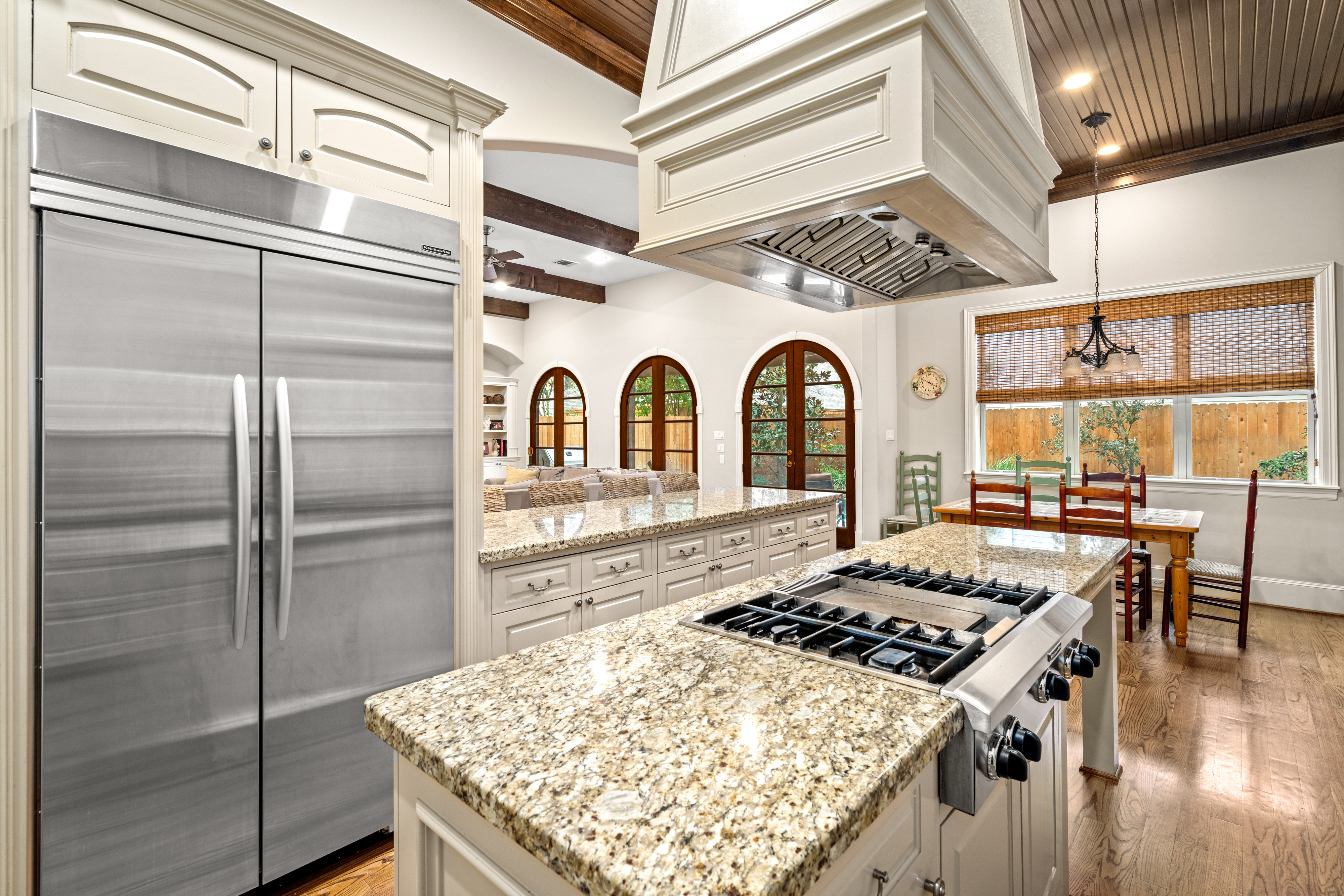 4219 Oberlin Street West University Place, TX 77005 - Photo 13 of 33 a kitchen with stainless steel appliances granite countertop a stove and a refrigerator