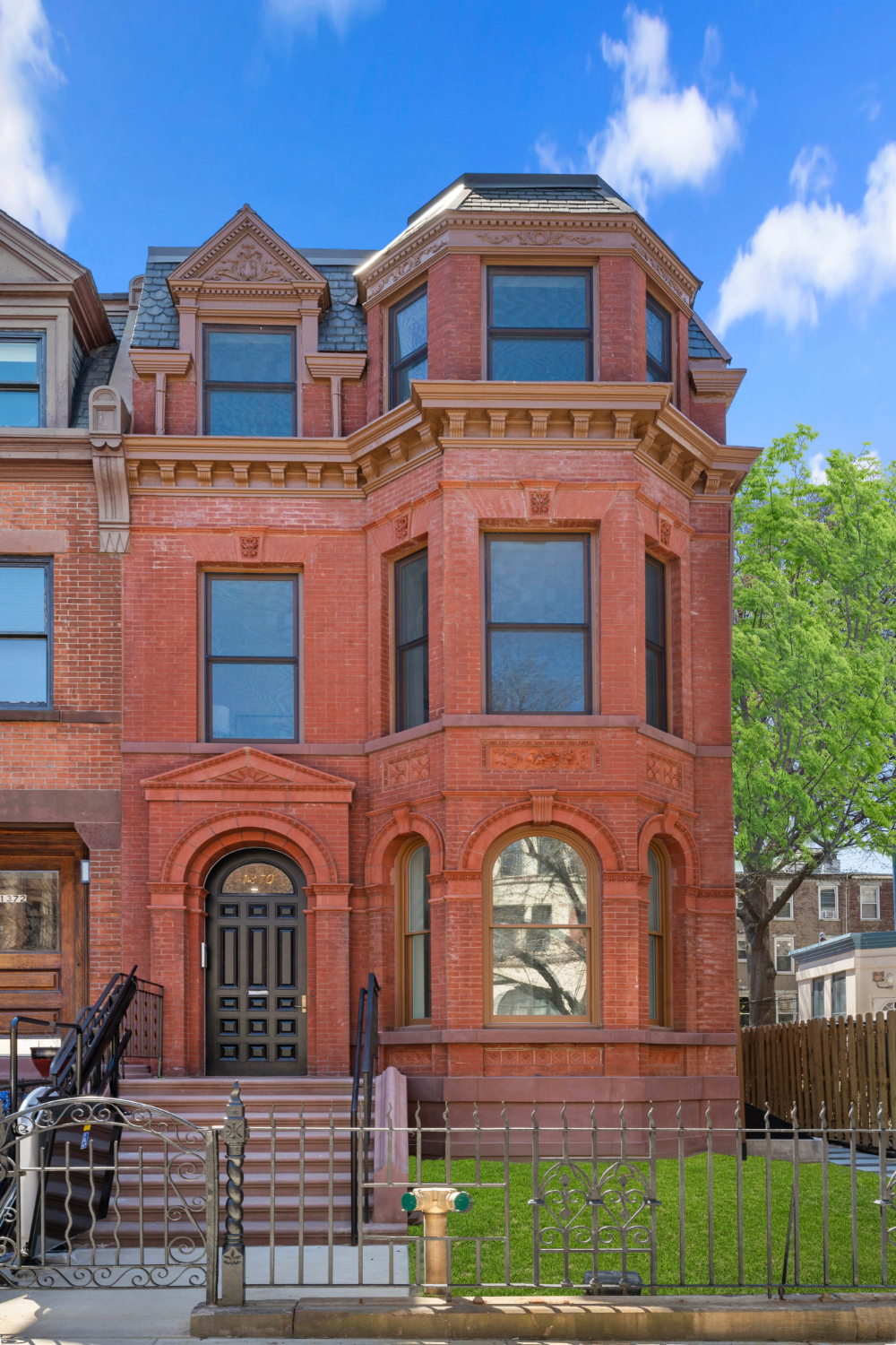1370 Dean Street, Unit C Brooklyn, NY 11216 - Photo 6 of 7 a front view of a house with garden
