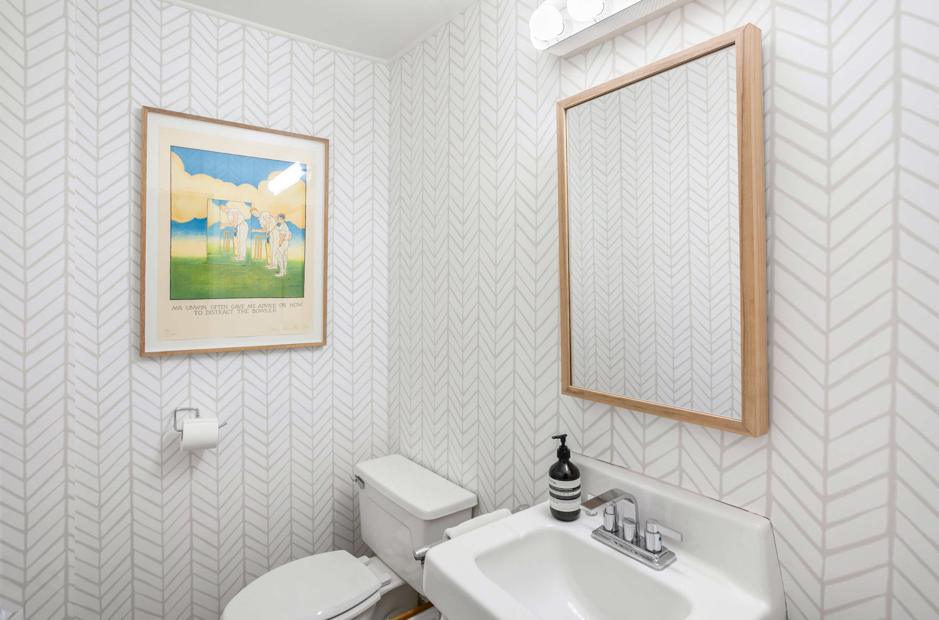 2123 California Street Northwest, Unit D5 Washington, DC 20008 - Photo 10 of 25 a bathroom with a toilet a sink and mirror