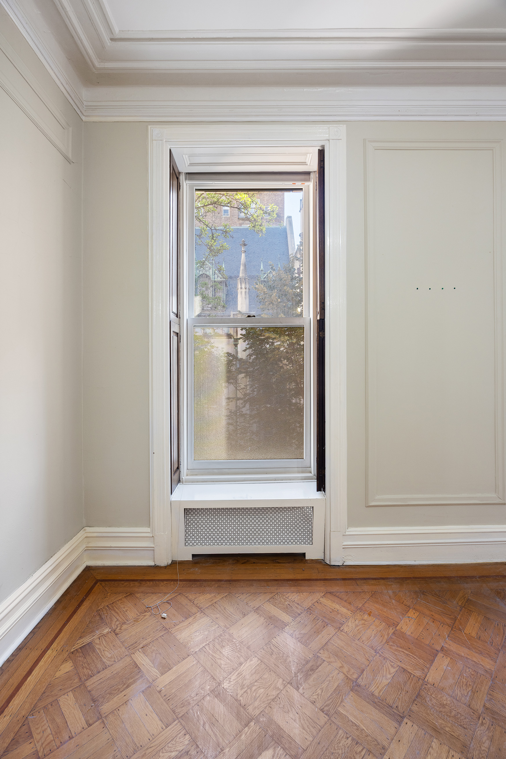 38 East 73rd Street Manhattan, NY 10021 - Photo 13 of 25 a view of empty room with window
