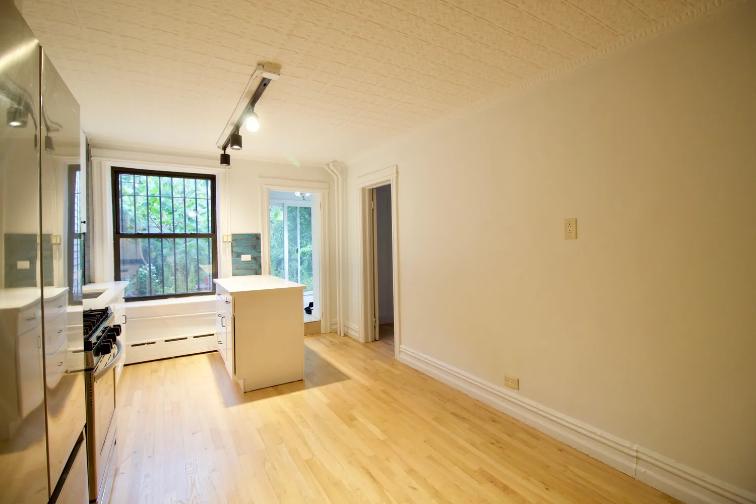 a view of livingroom with hardwood floor and ceiling fan