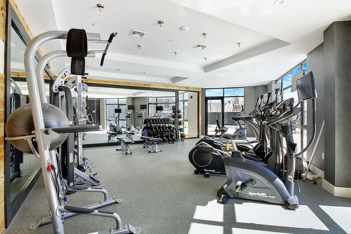 a view of a room with gym equipment