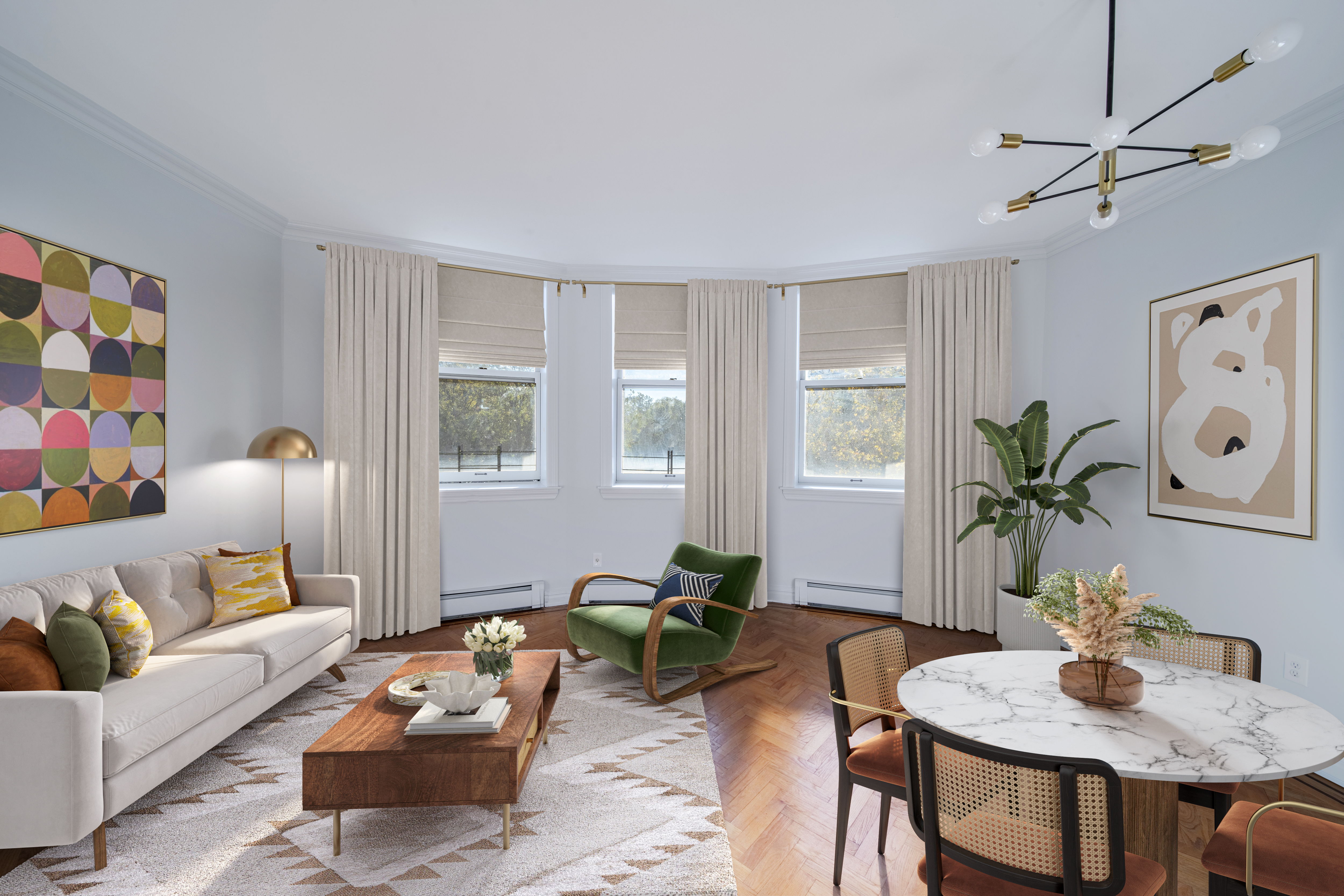 a living room with furniture and wooden floor