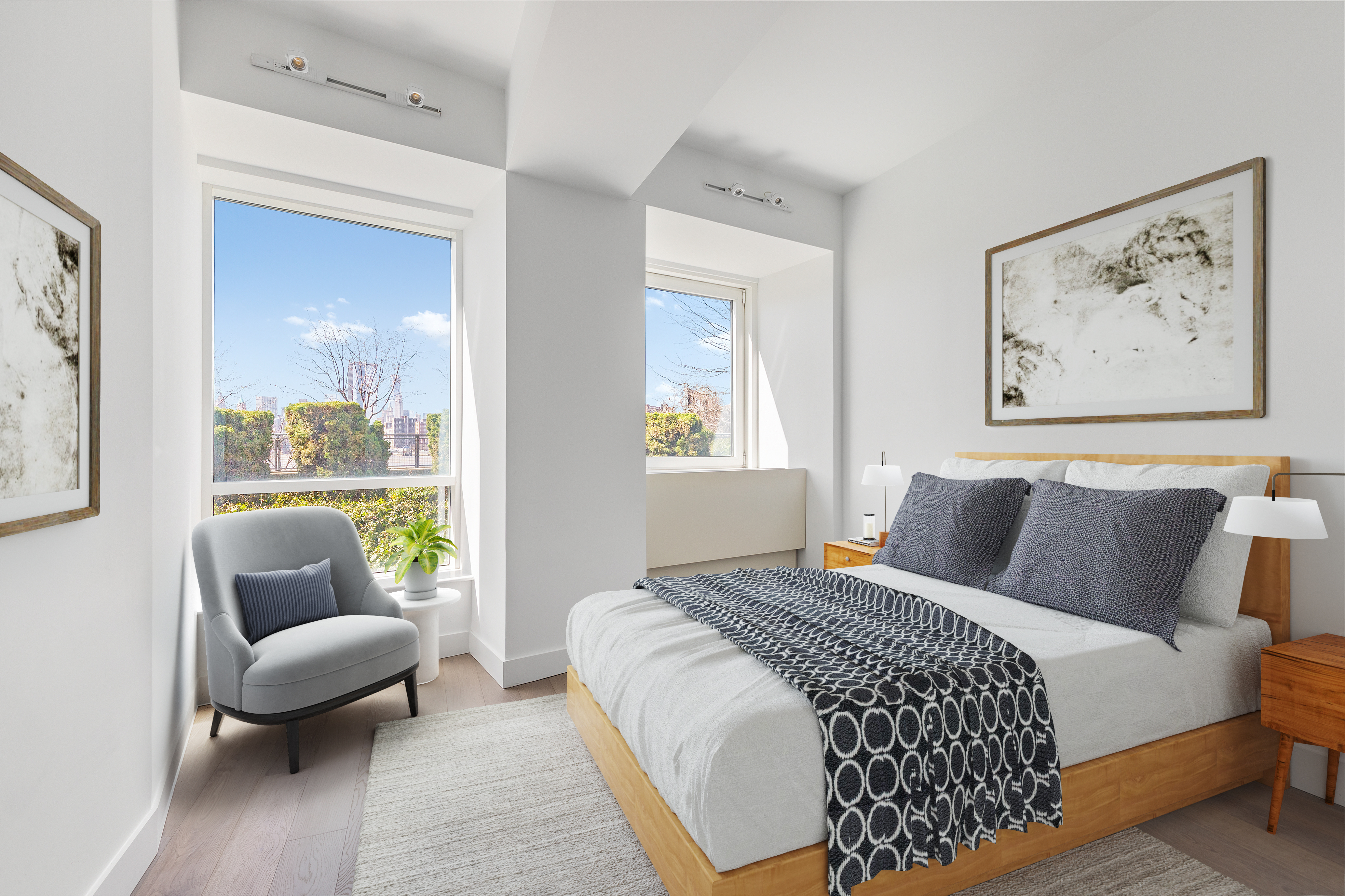 440 Kent Avenue, Unit 1B Brooklyn, NY 11249 - Photo 11 of 20 a bedroom with furniture and a large window