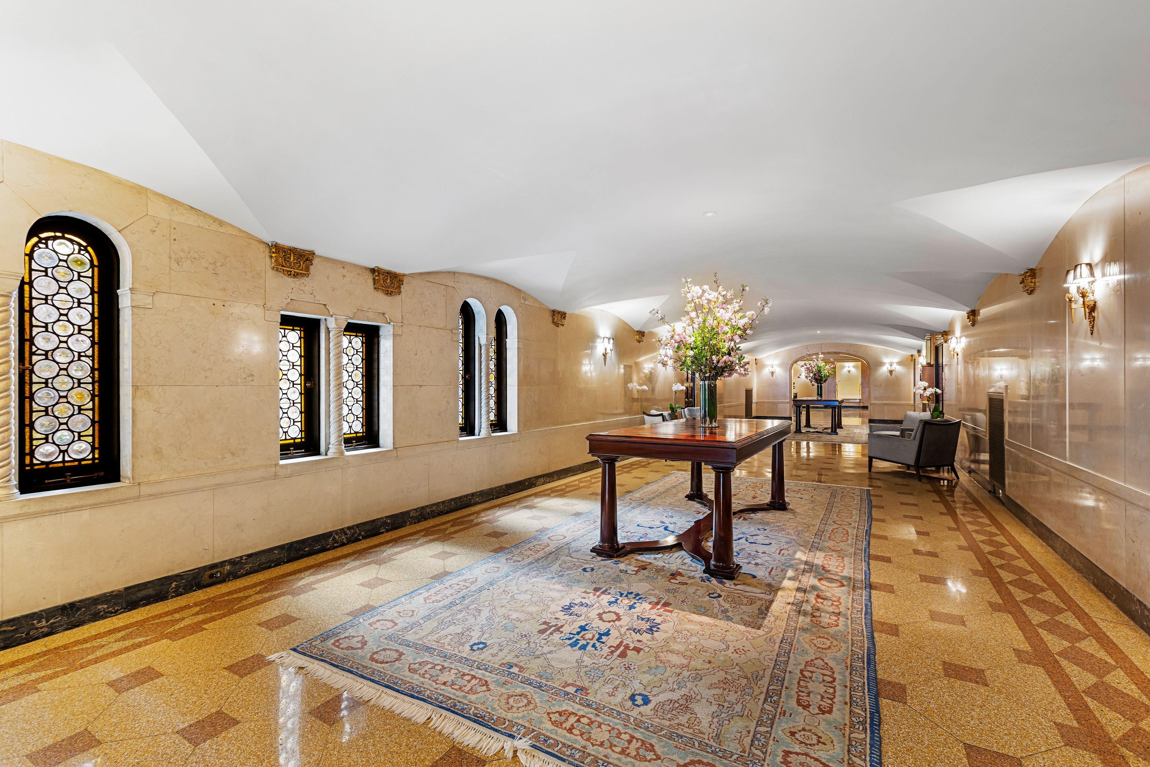 25 East 86th Street, Unit 1D Manhattan, NY 10028 - Photo 14 of 17 a lobby with furniture and a rug