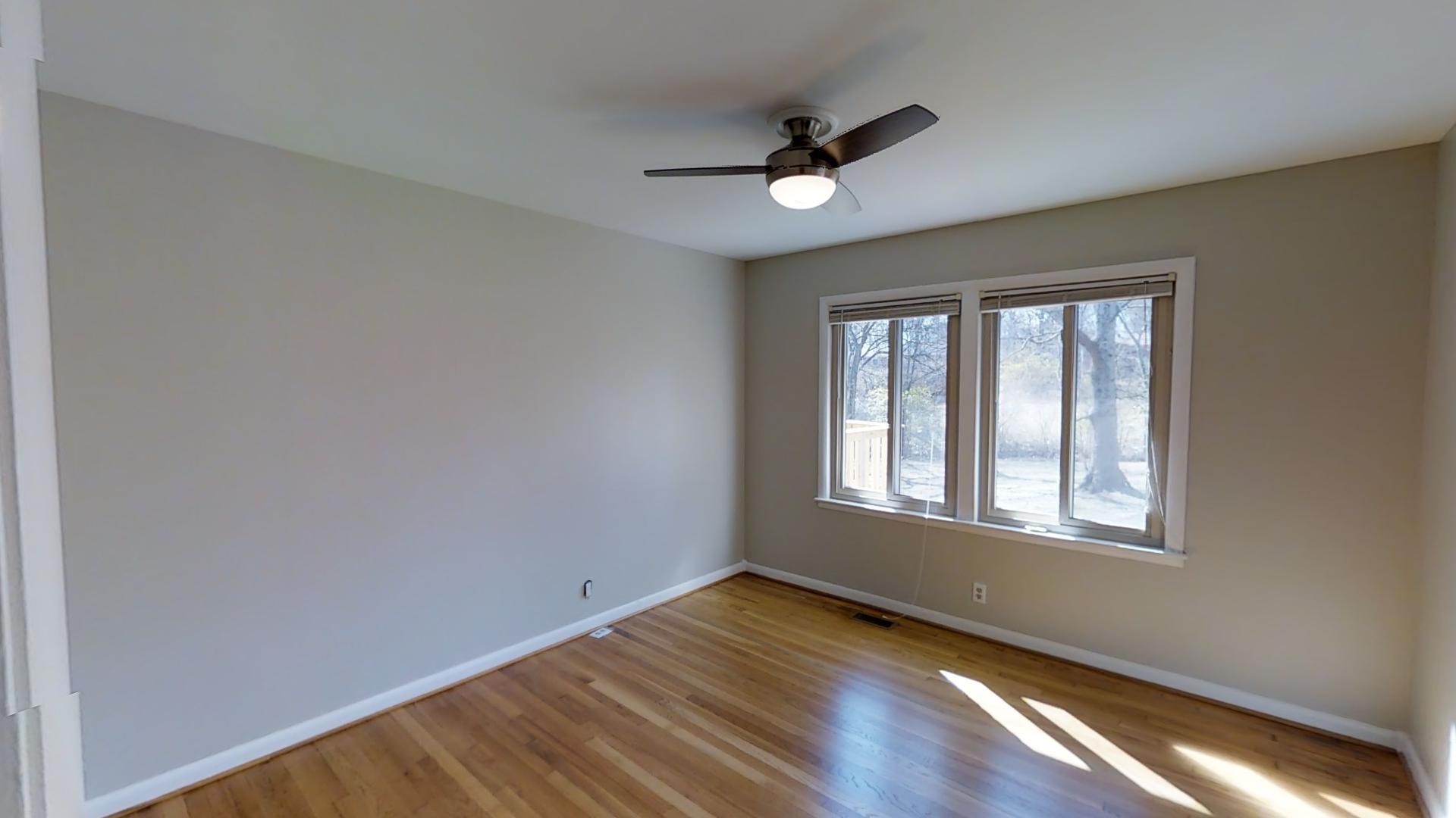 4425 Prescott Road Nashville, TN 37204 - Photo 15 of 26 a view of an empty room with wooden floor and a window