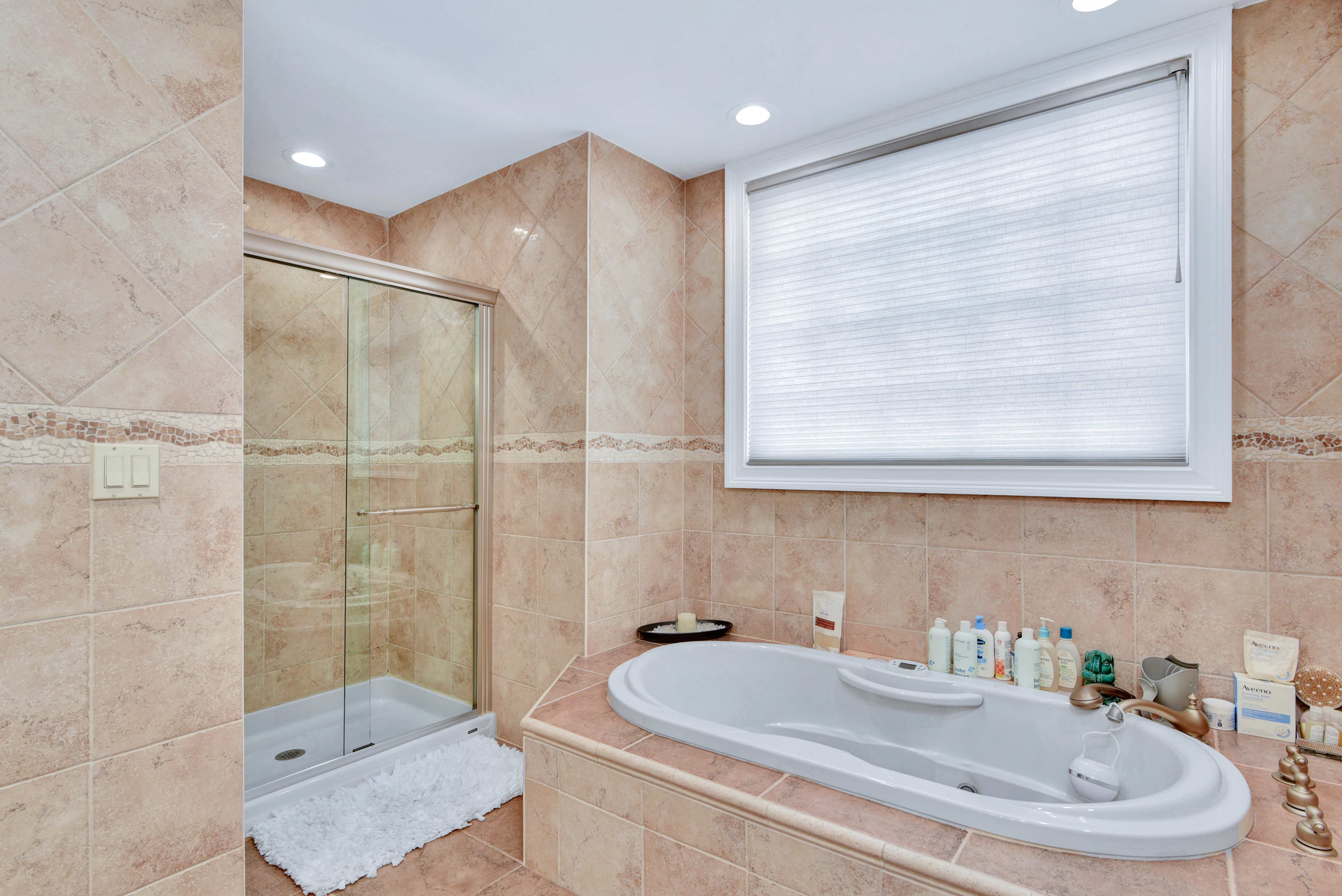 215 Lawrence Avenue Staten Island, NY 10310 - Photo 24 of 45 a bathroom with a sink and a mirror